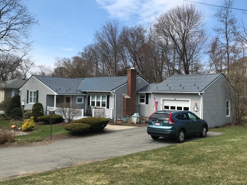 Stoneham, MA home with Interlock Slate aluminum metal roof in Deep Charcoal.