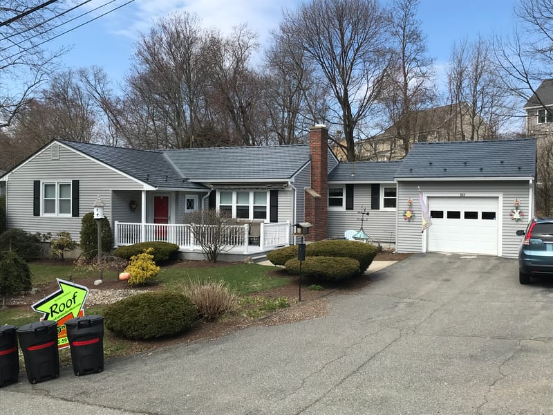 Interlock Slate metal roofing in Deep Charcoal, Stoneham, MA home installation.