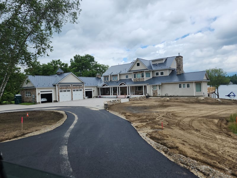 Deep Charcoal Interlock Slate aluminum metal roof on a Center Harbor, NH home.