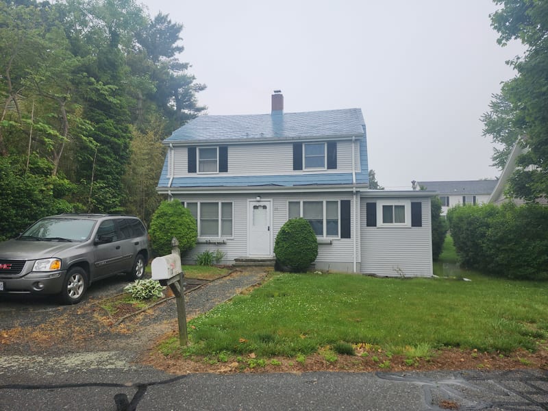 Black Interlock aluminum metal roof on a Portsmouth, Rhode Island home.