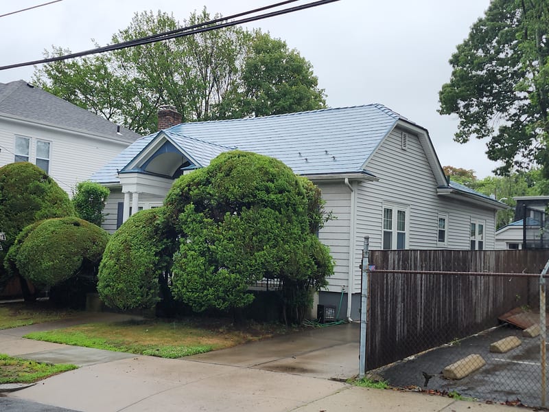 Deep Charcoal Interlock aluminum shingle roof on Providence, Rhode Island home.