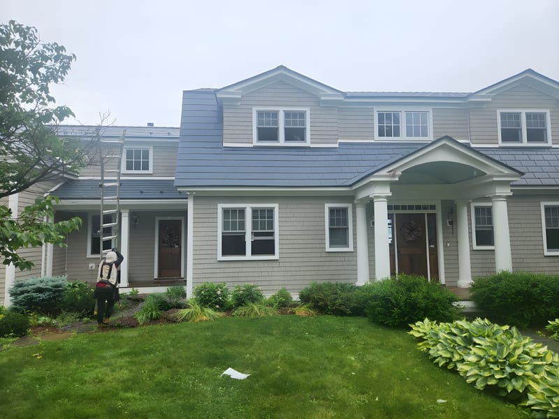 Deep Charcoal Interlock Slate metal roof installed on a Vermont home in Panton