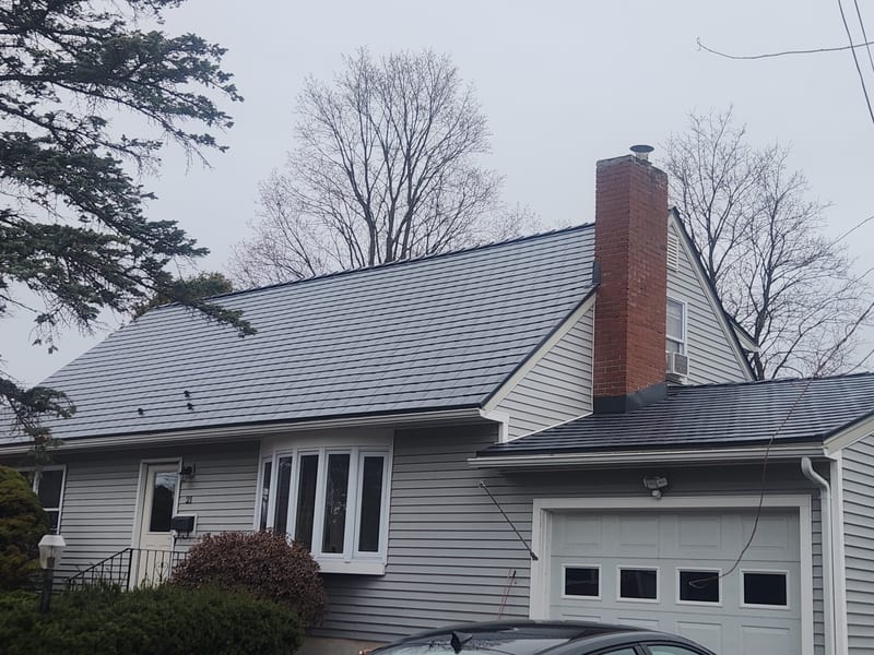 Interlock Slate aluminum metal roof in Deep Charcoal, South Burlington Vermont home installation.