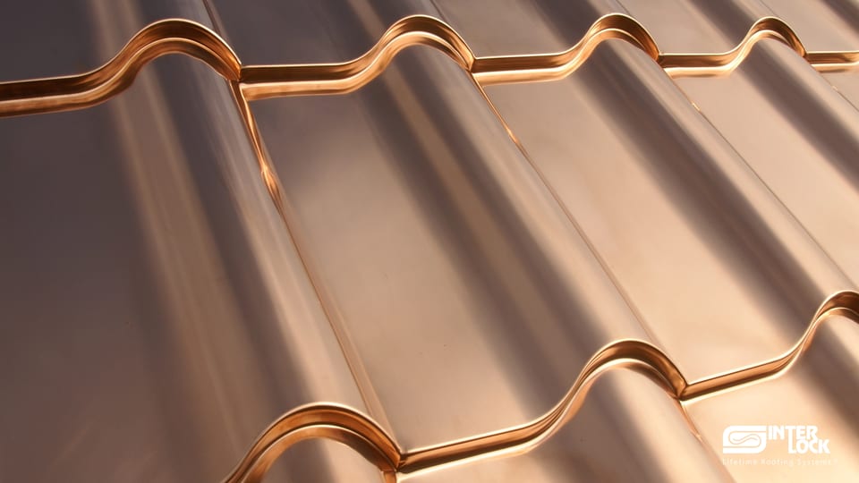 Close-up of Interlock® solid copper Mediterranean tile panels — rolled S-profile in mill-finish copper