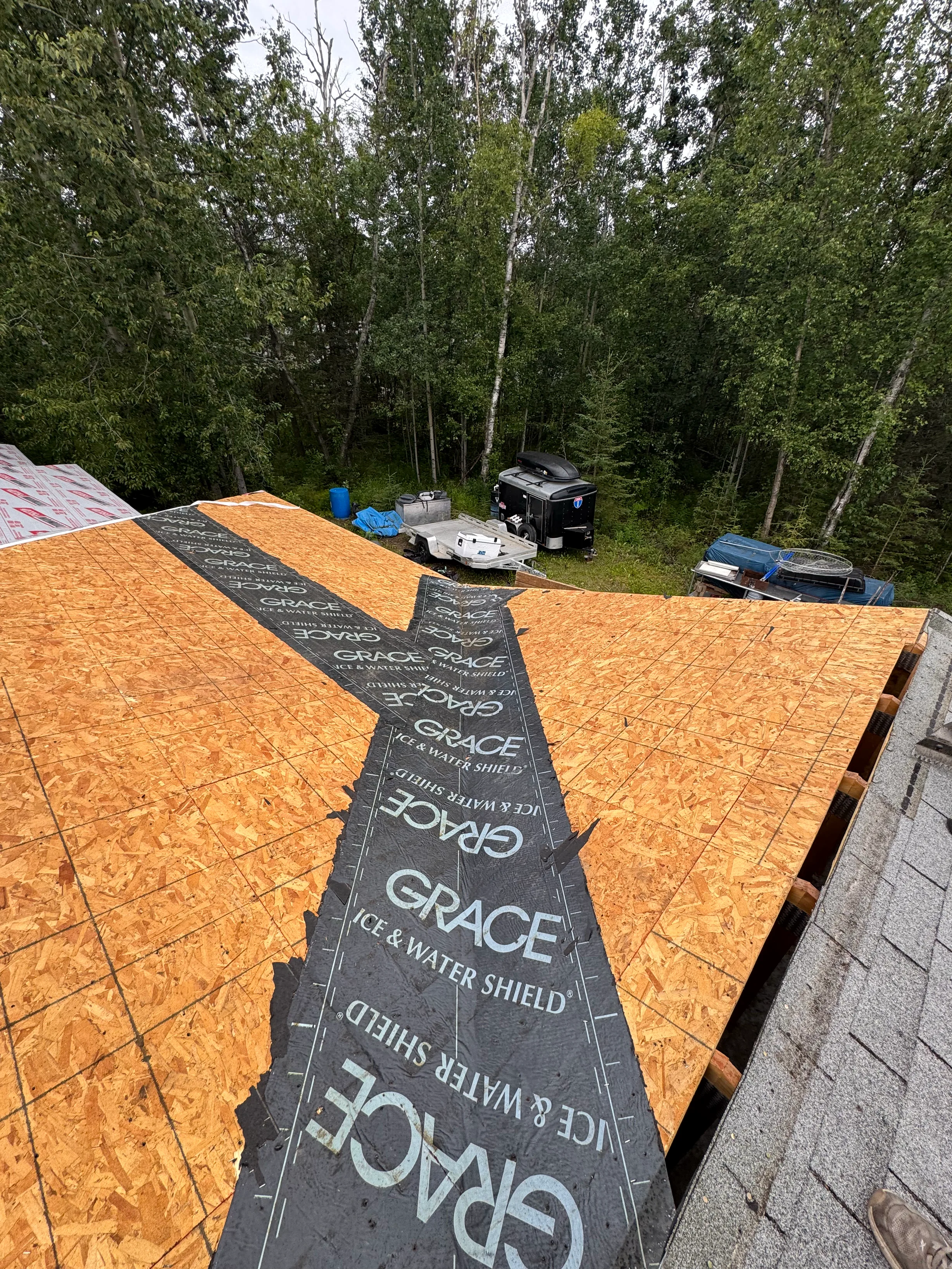 Interlock Aluminum Slate Metal Roofing – Black | Wasilla, AK (During installation)