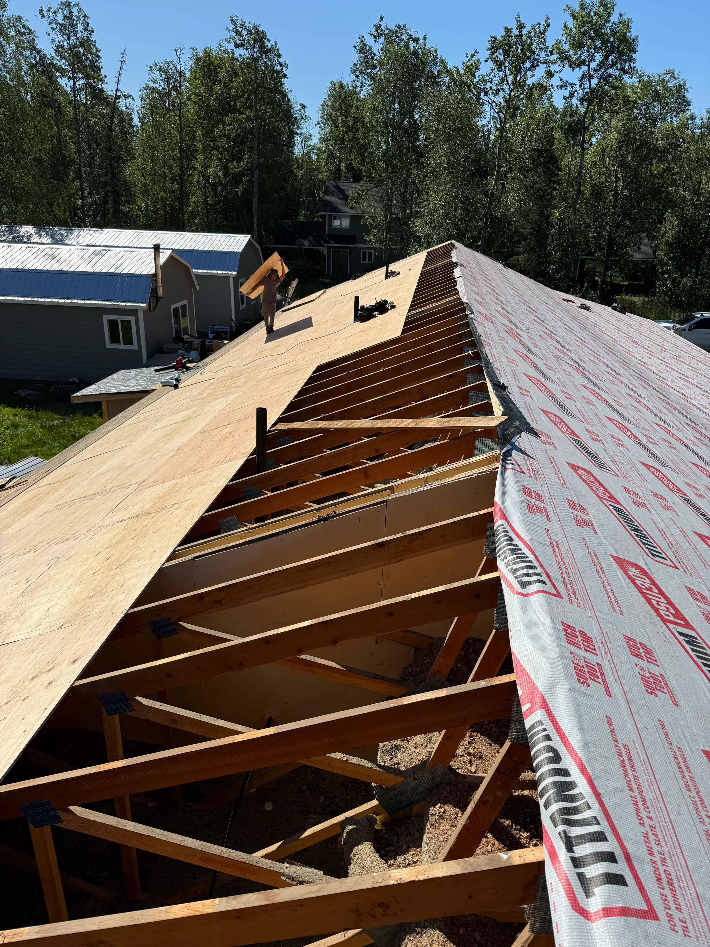 Interlock Aluminum Shake Metal Roofing – Copper Penny | Wasilla, AK (During installation)