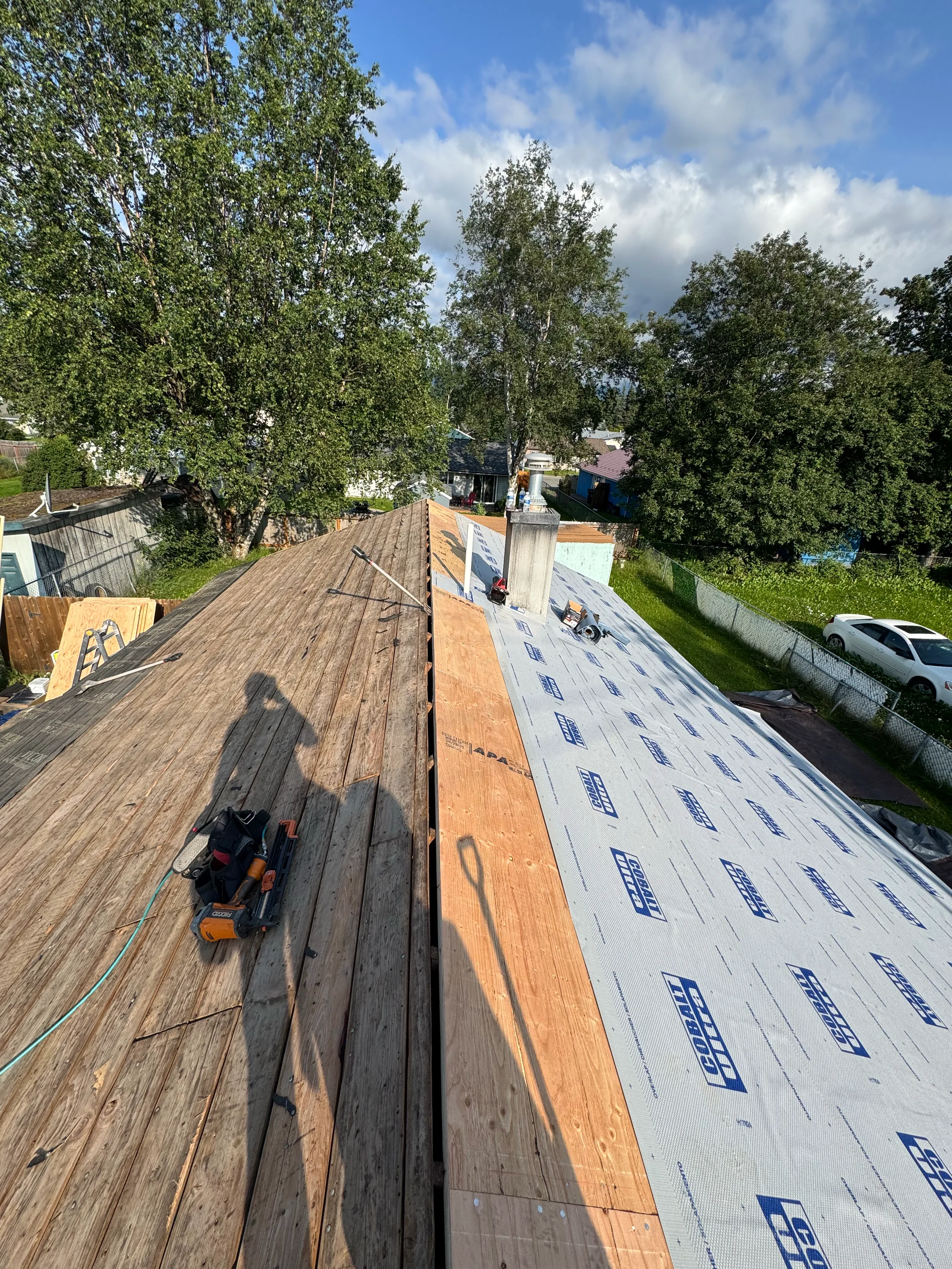 Interlock Aluminum Cedar Shingle Metal Roofing – Tile Red | Anchorage, AK (During installation)