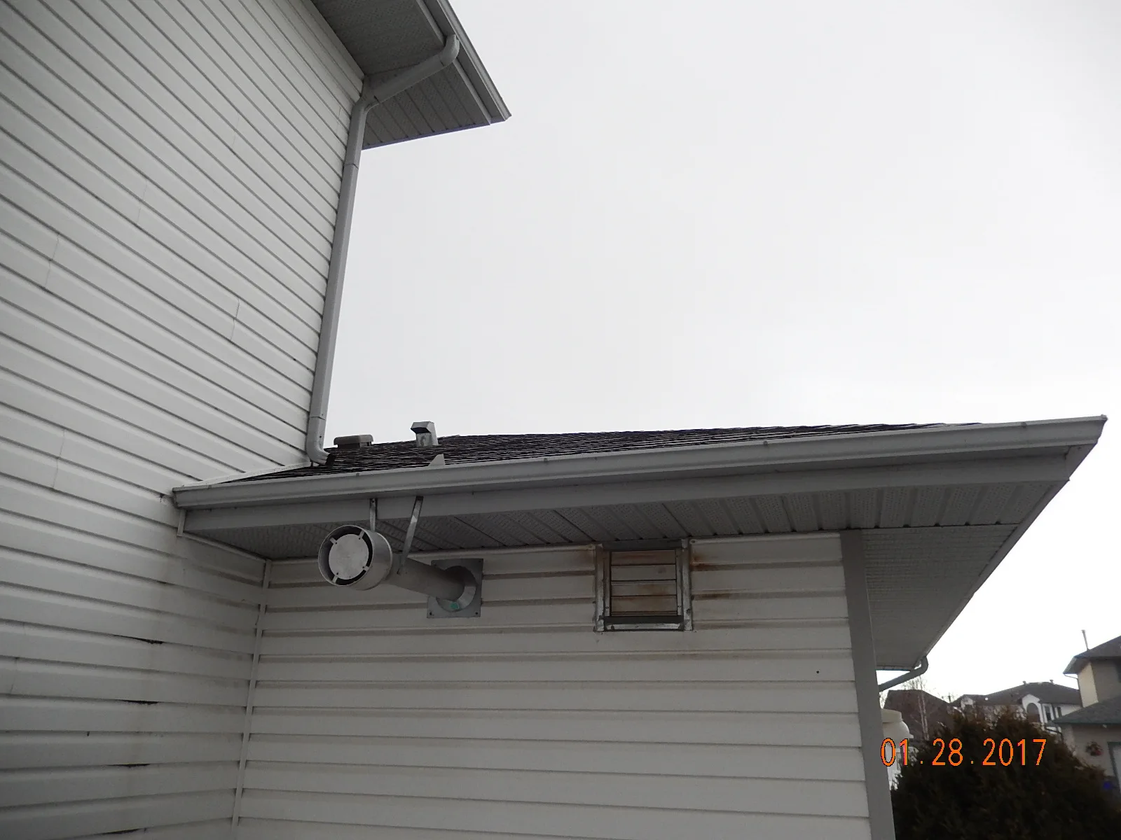 Deep Charcoal Interlock Slate aluminum roof on a single-family home with a metal roof in a rural suburban, Fort Saskatchewan, Alberta