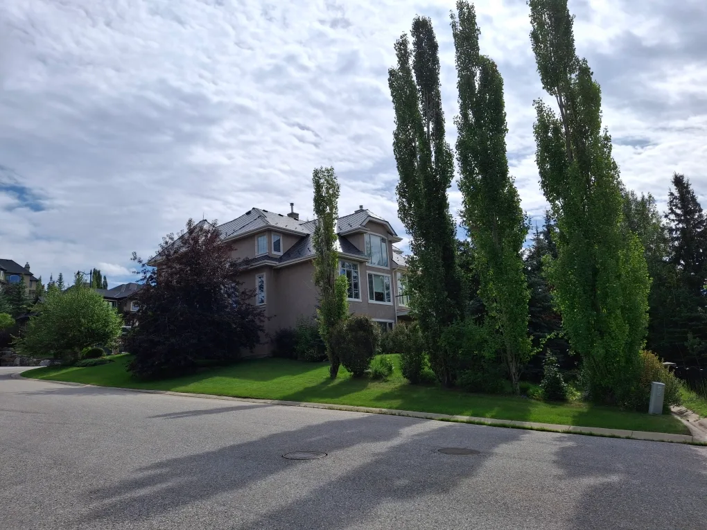 Interlock Aluminum Slate Metal Roofing – Deep Charcoal | Calgary, AB (Street view)