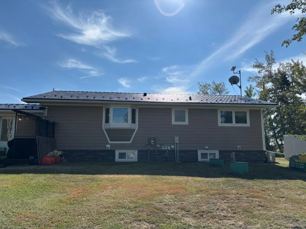 Interlock Aluminum Slate Metal Roofing – Deep Charcoal | Sexsmith, AB (Rear elevation)