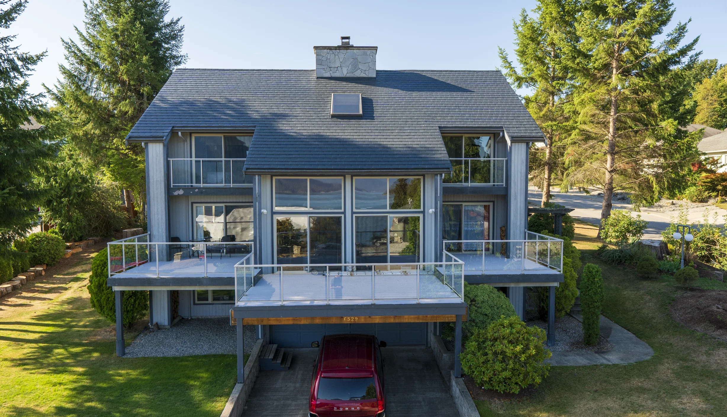 Deep Charcoal Interlock Slate aluminum roof on a large Deep Charcoal Interlock Slate metal roof on a, Sechelt, British Columbia