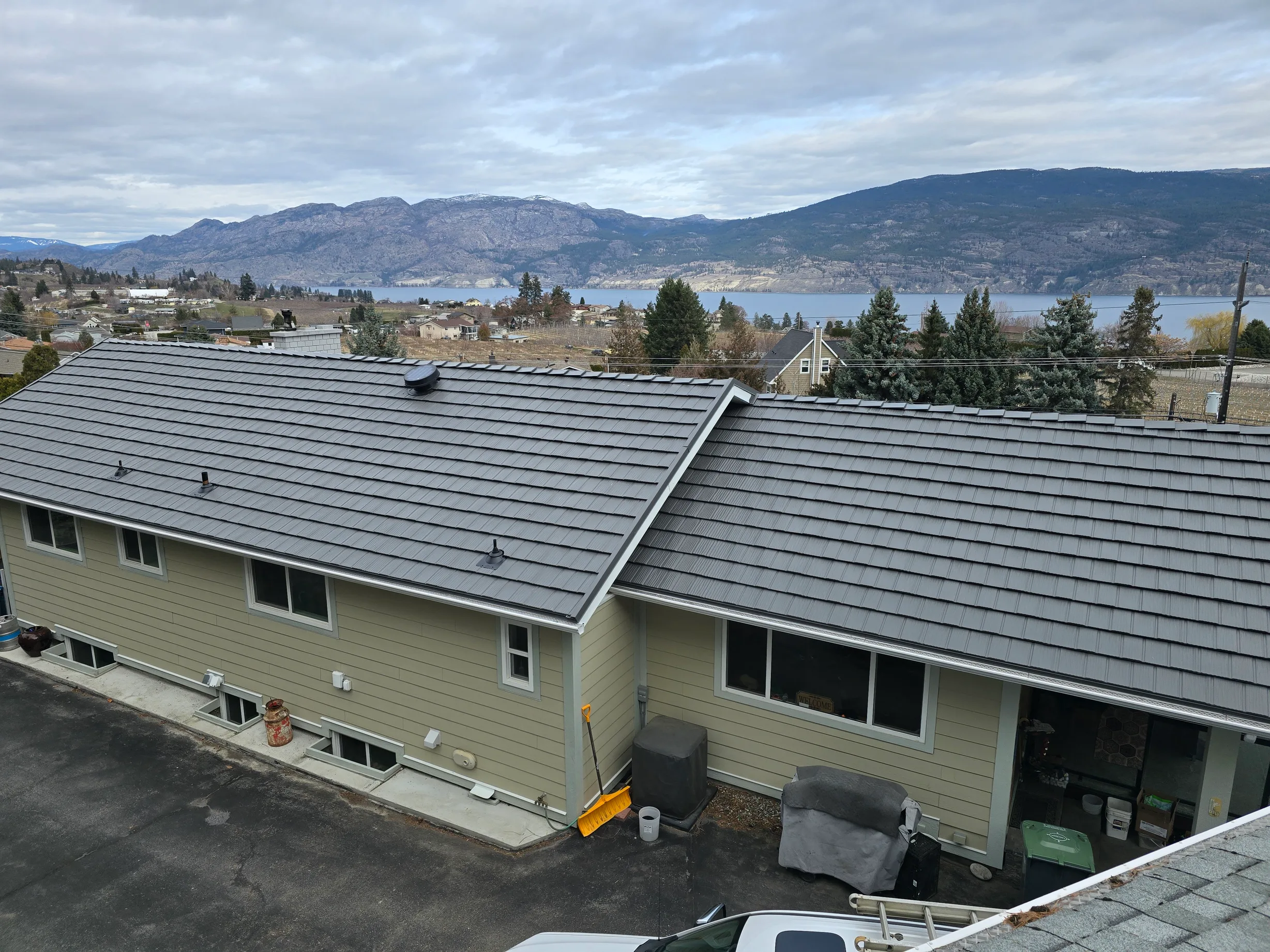 Musket Grey Interlock Shake aluminum roof on the home, Summerland, British Columbia