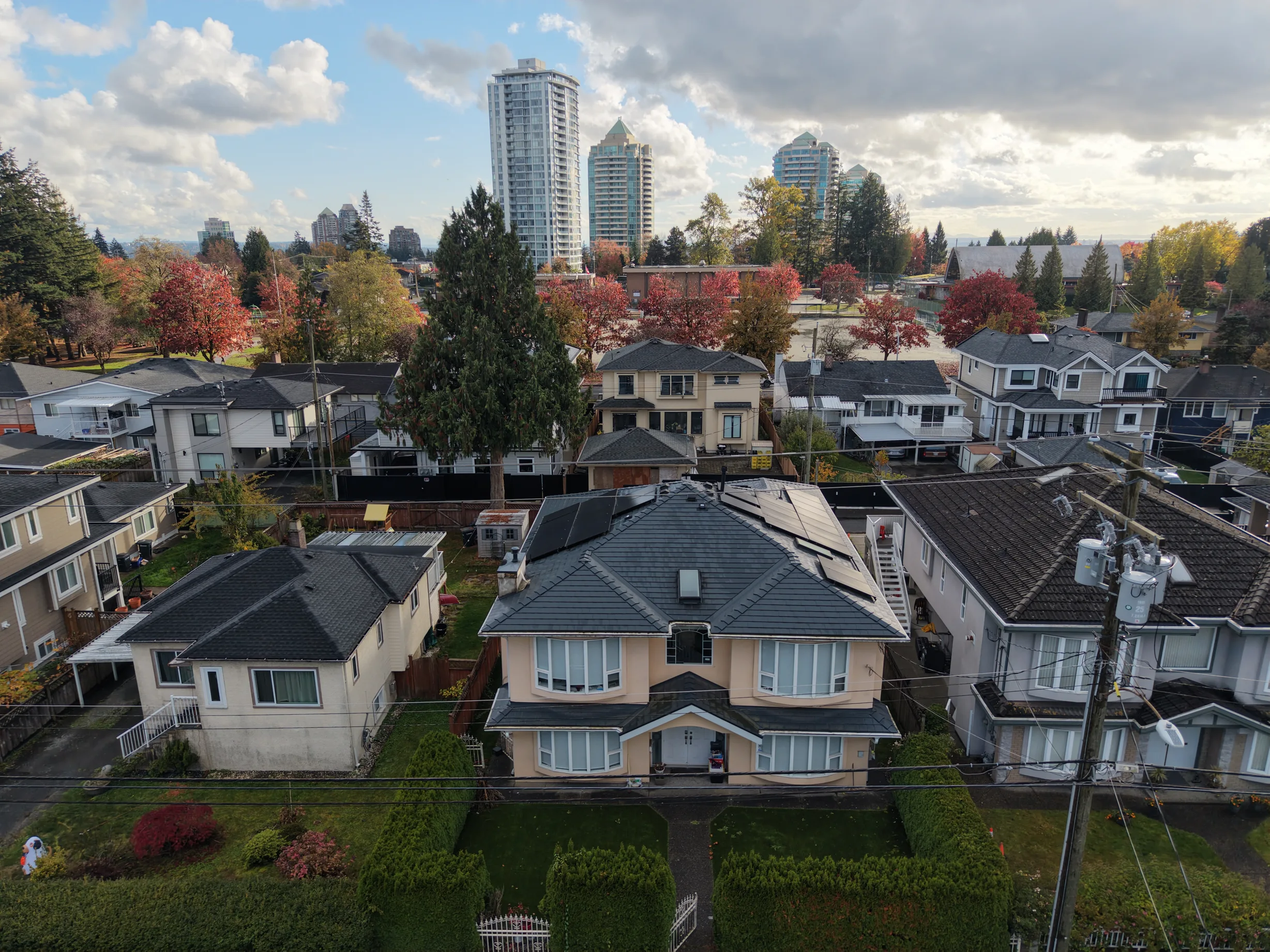 Deep Charcoal Interlock Slate aluminum roof on a two-storey modern home with a metal roof in Burnaby, BC, Burnaby, British Columbia