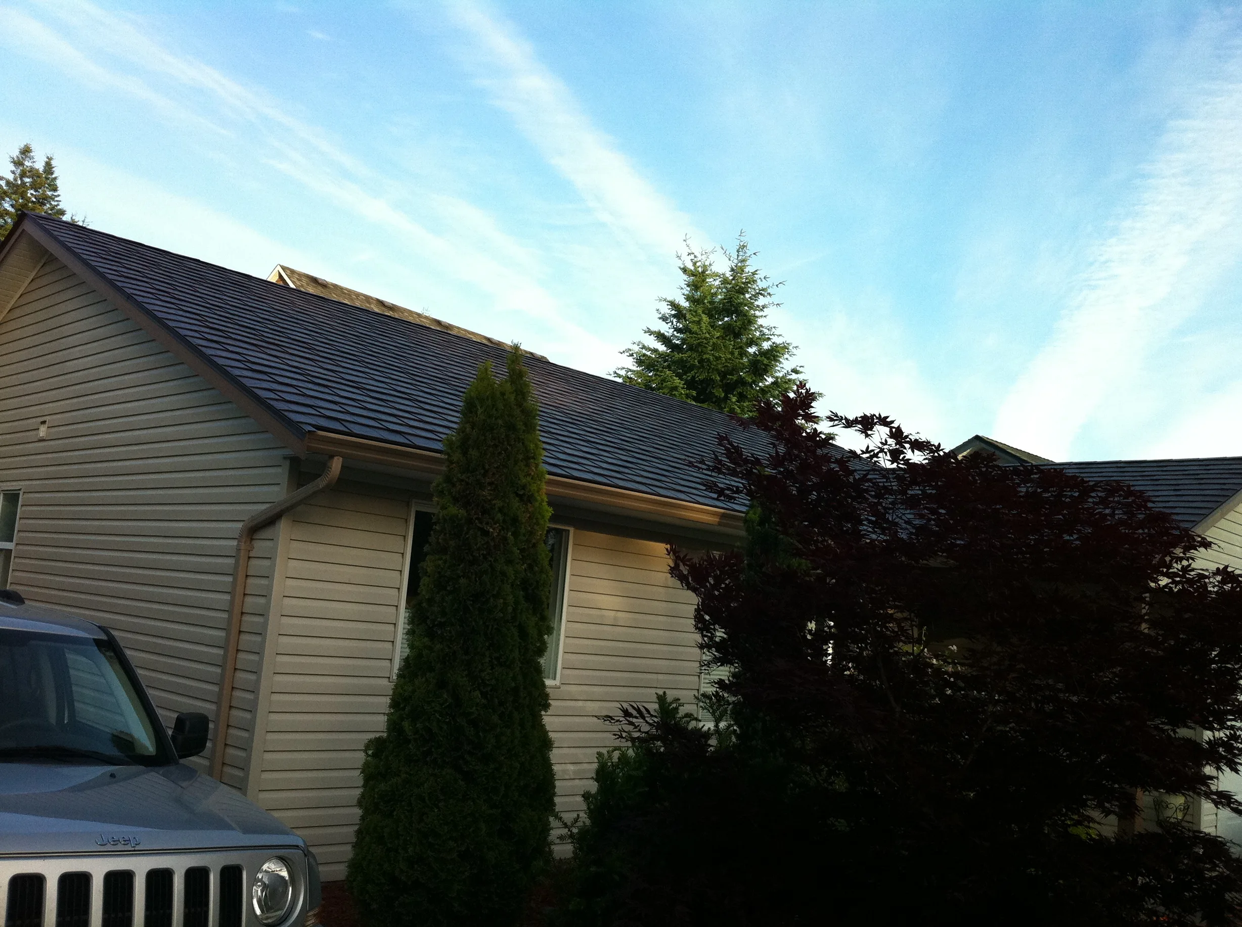 Colonial Brown Interlock Slate aluminum roof on a Colonial home with a Colonial Brown metal roof in, Campbell River, British Columbia