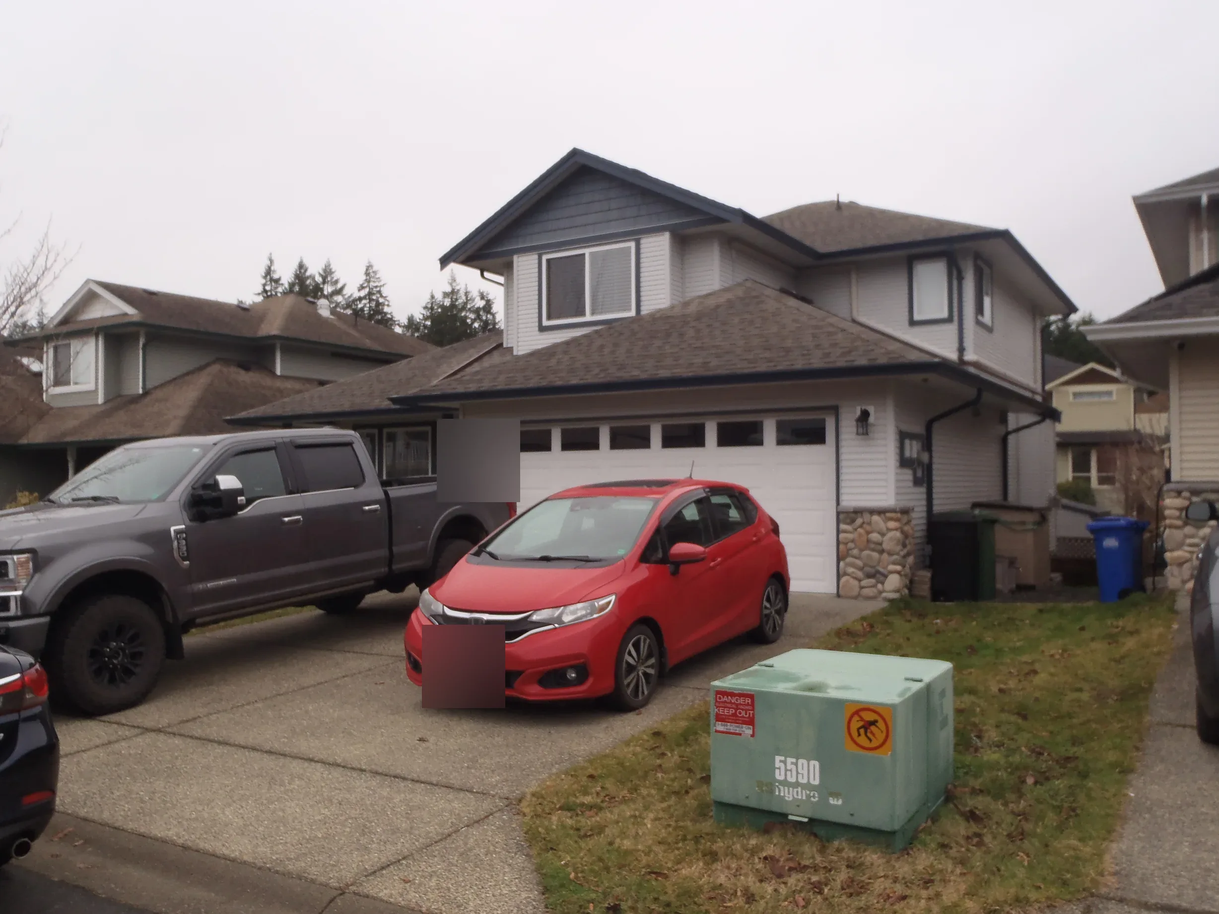 Before: a leaking asphalt shingle roof on the home, Sooke, British Columbia, ahead of a Black Interlock Slate aluminum roof