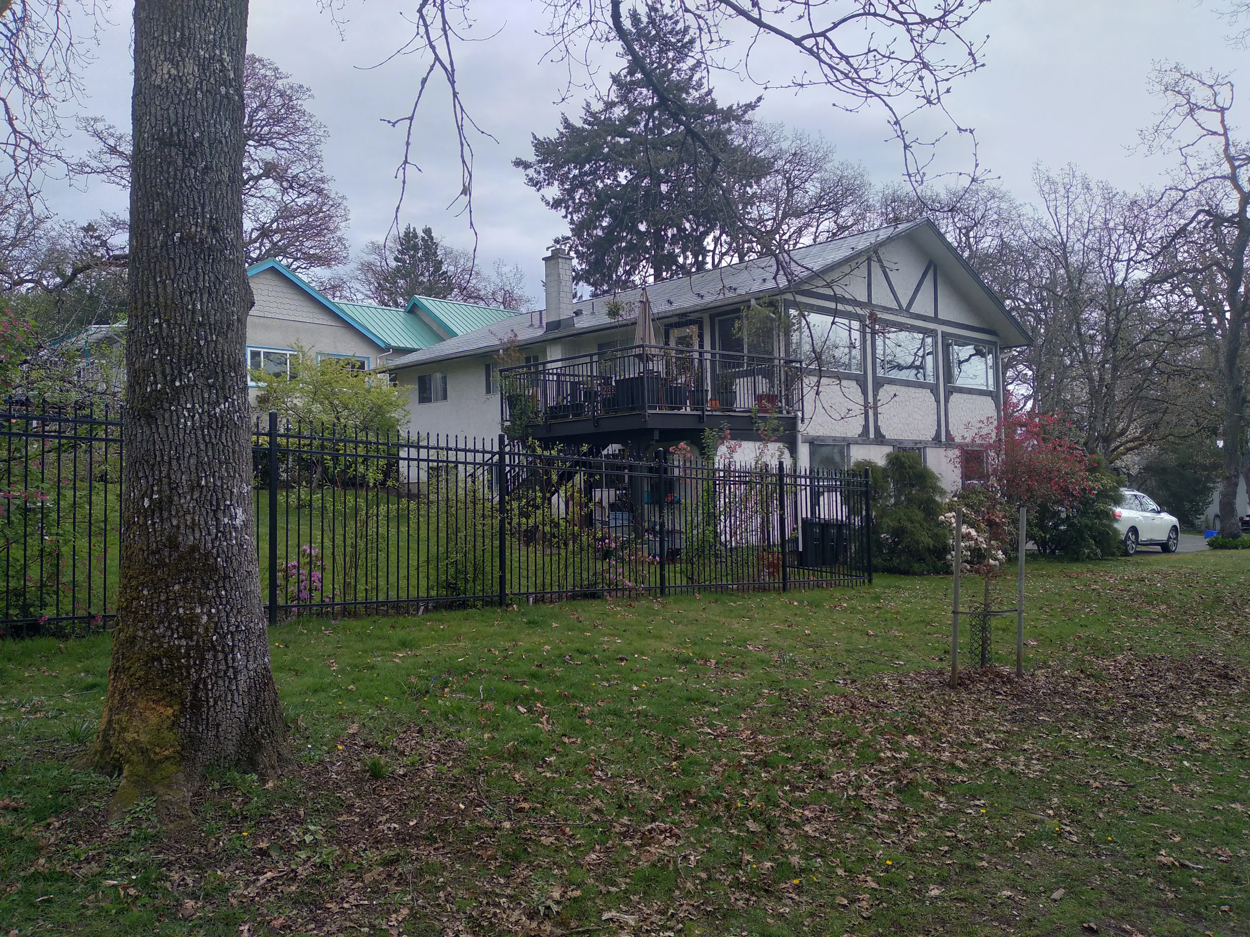 Black Interlock Slate aluminum roof on a house with a metal roof in a rural setting, Victoria, British Columbia