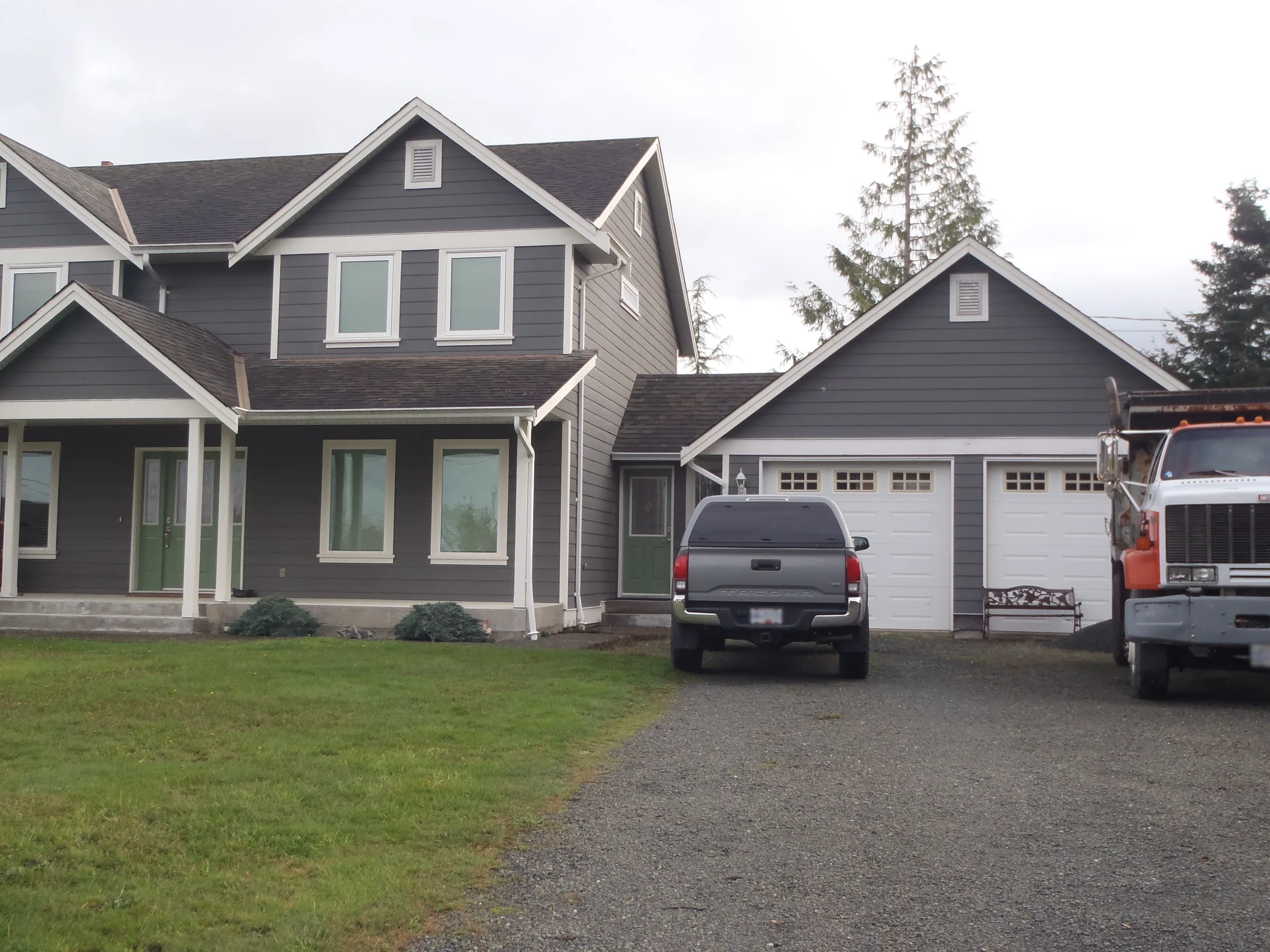 Before: a leaking asphalt shingle roof on the home, Sooke, British Columbia, ahead of a Black Interlock Slate aluminum roof