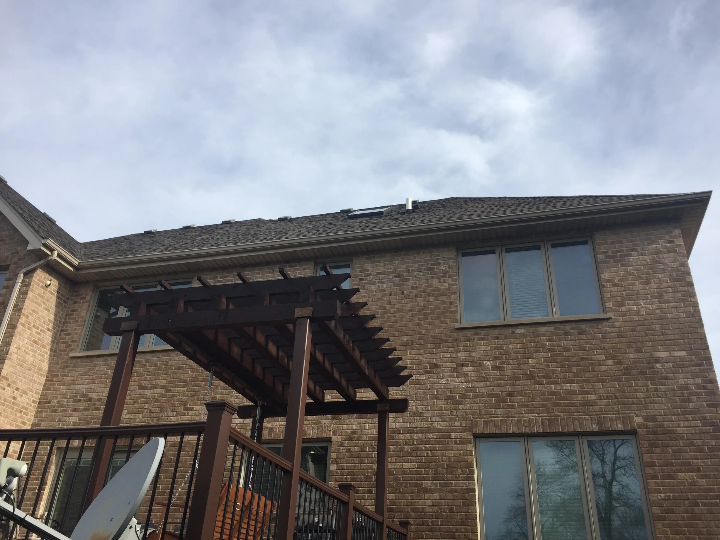 Before: a leaking asphalt shingle roof on the home, Roselle, Illinois, ahead of a Tudor Brown Interlock Slate aluminum roof