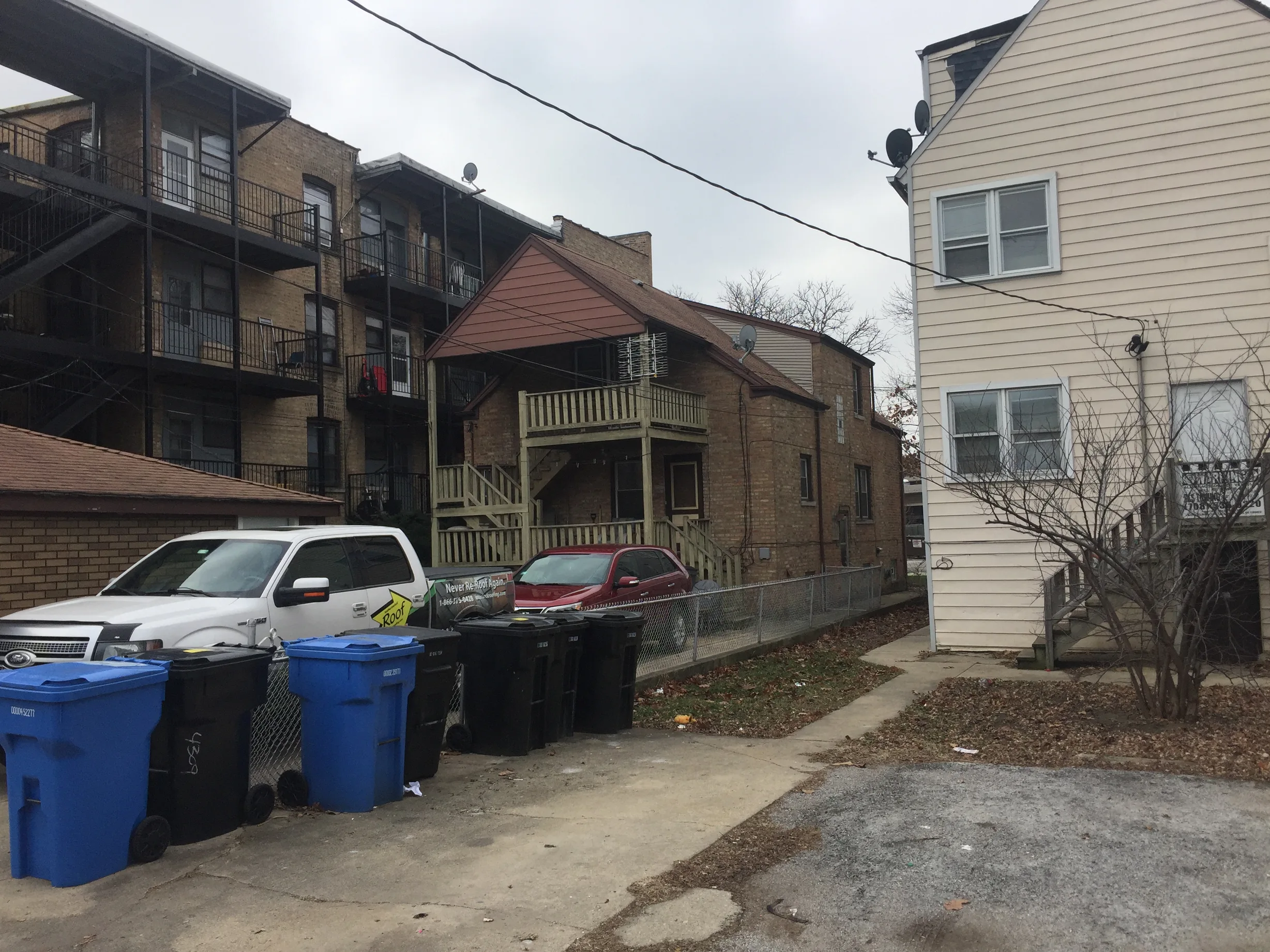 Before: a leaking asphalt shingle roof on the home, Chicago, Illinois, ahead of a Colonial Brown Interlock Slate aluminum roof