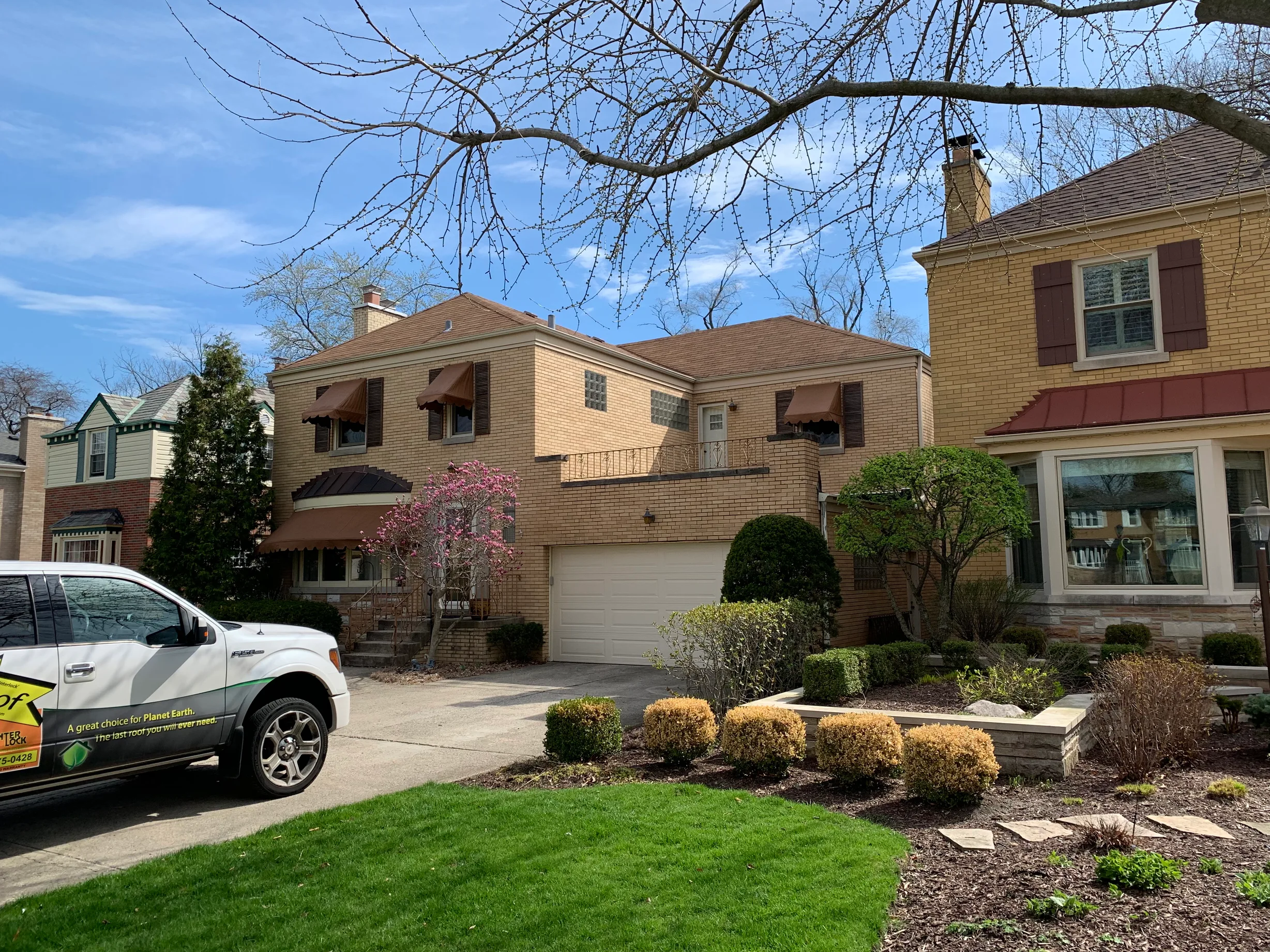 Before: a leaking asphalt shingle roof on the home, River Forest, Illinois, ahead of a Colonial Brown Interlock Slate aluminum roof