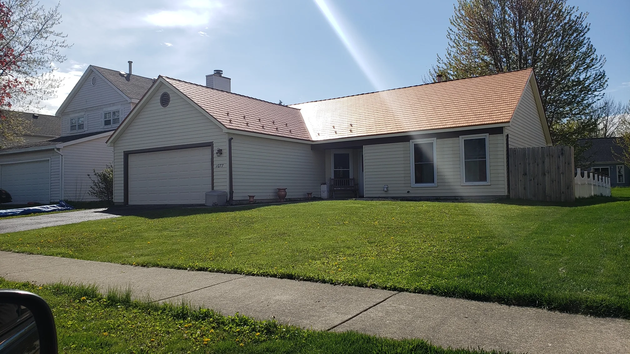 Copper Penny Interlock Cedar Shingle aluminum roof on a ranch style home with a copper penny metal roof in a, Bolingbrook, Illinois