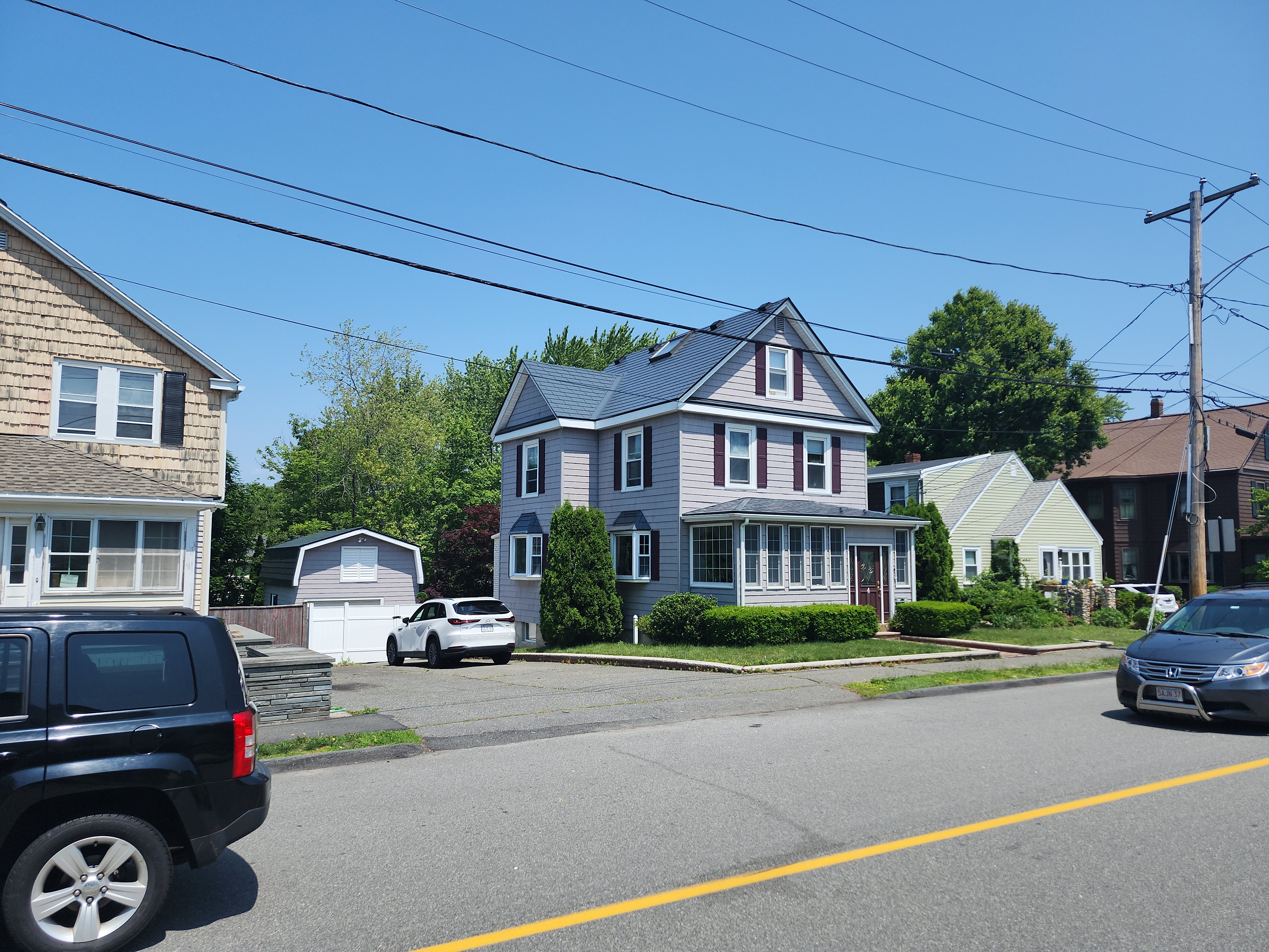 Interlock Aluminum Slate Metal Roofing – Deep Charcoal | Saugus, MA (Front-left elevation)