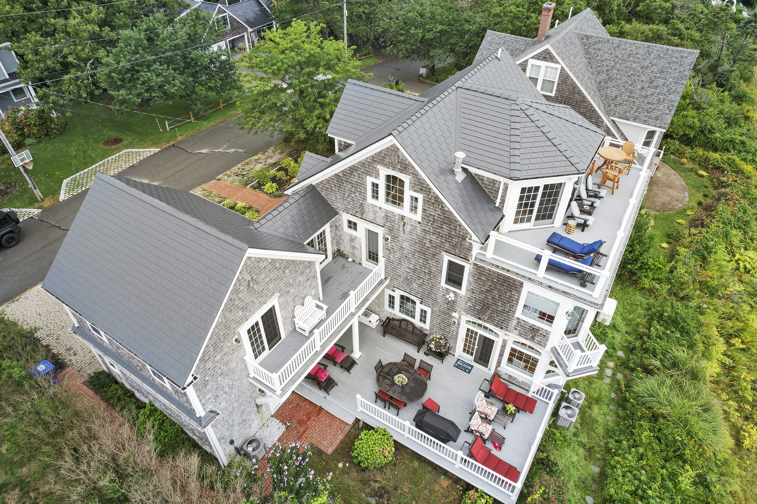 Interlock Aluminum Slate Metal Roofing – Deep Charcoal | Sagamore Beach, MA (Rear-left elevation)