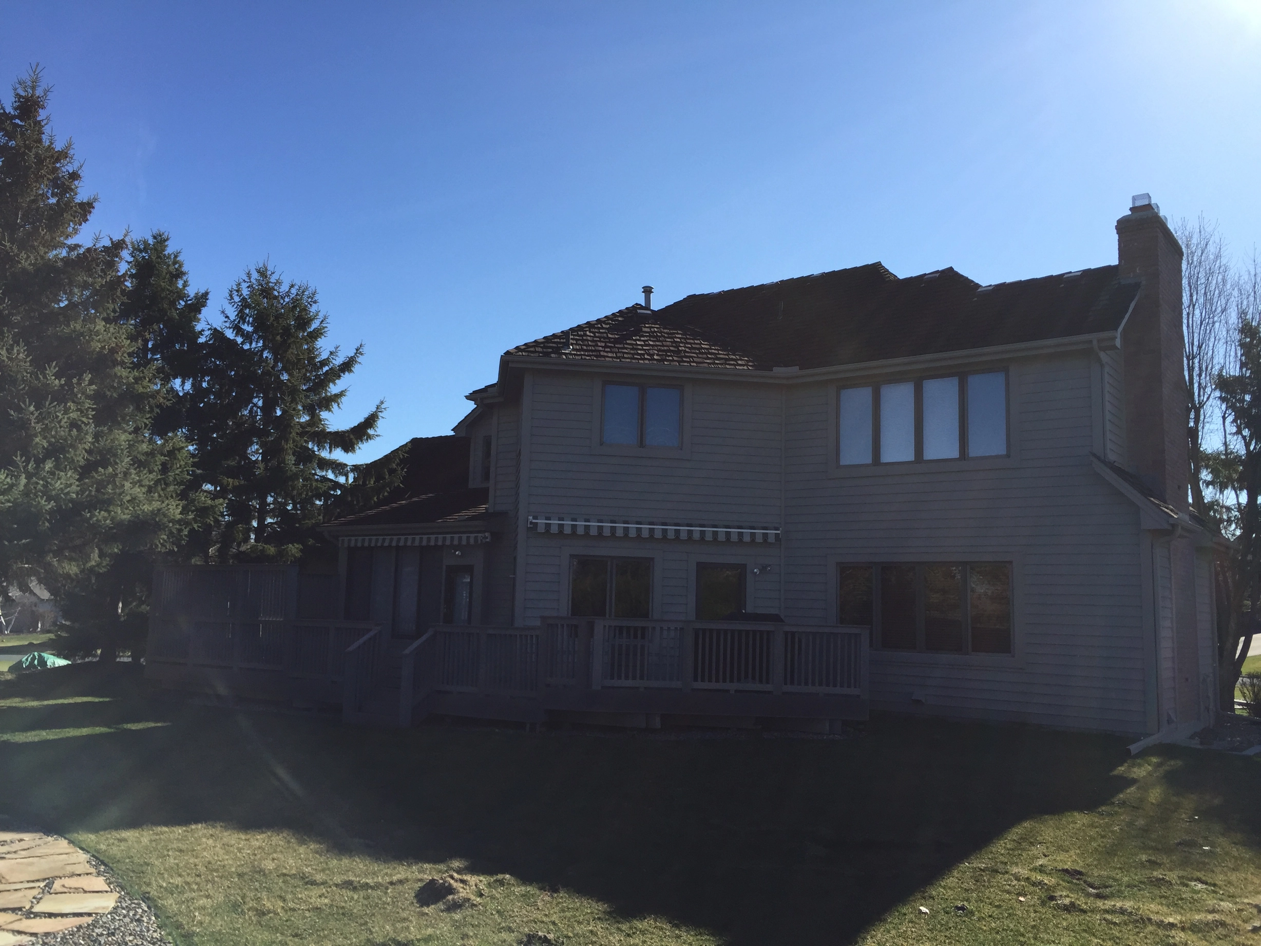 Before: a worn out wood shake roof on the home, Mendota Heights, Minnesota, ahead of a Weathered Interlock Shake aluminum roof