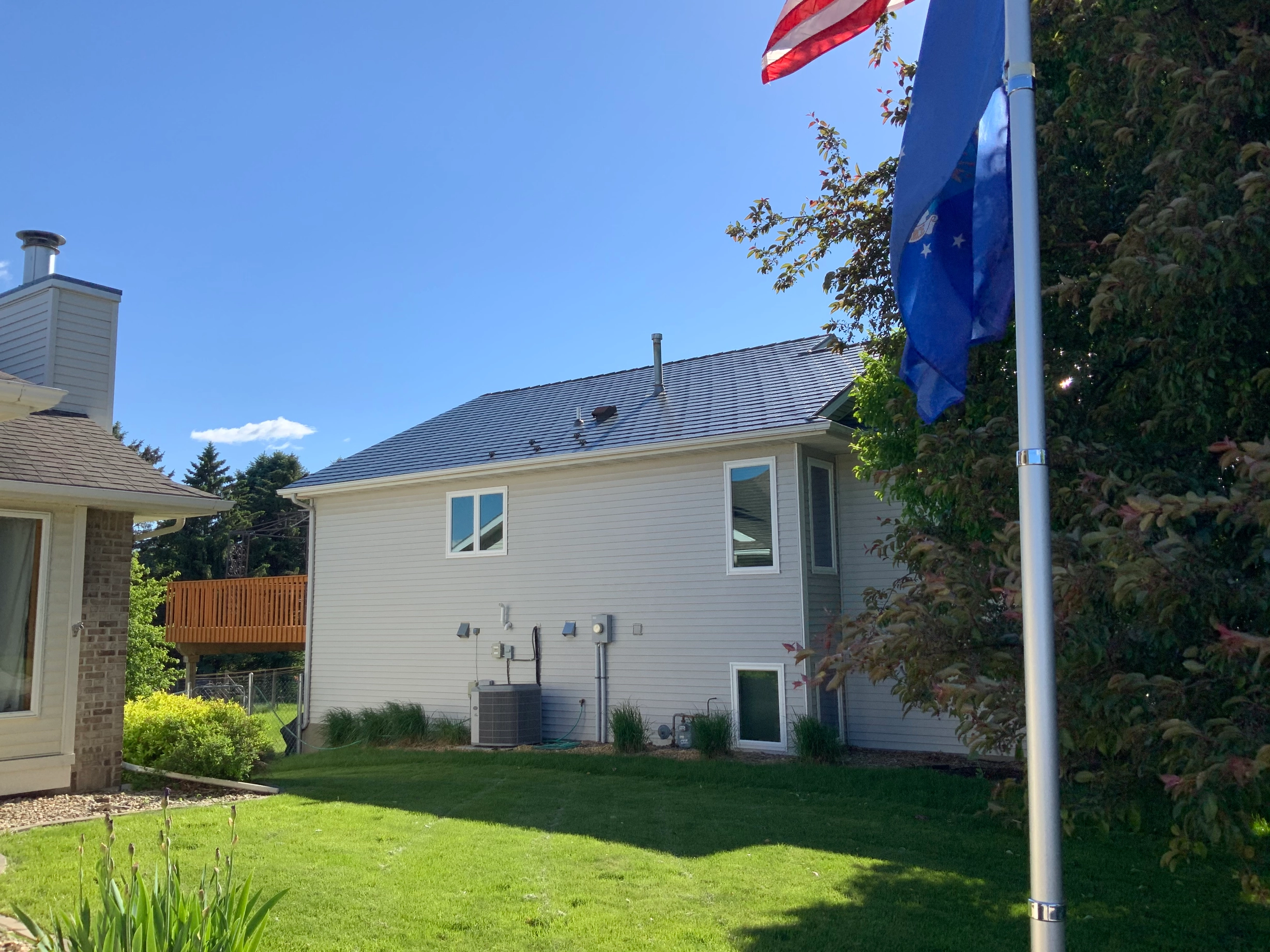 Deep Charcoal Interlock Slate aluminum roof on a Deep Charcoal Interlock Slate metal roof on a modern, Rochester, Minnesota