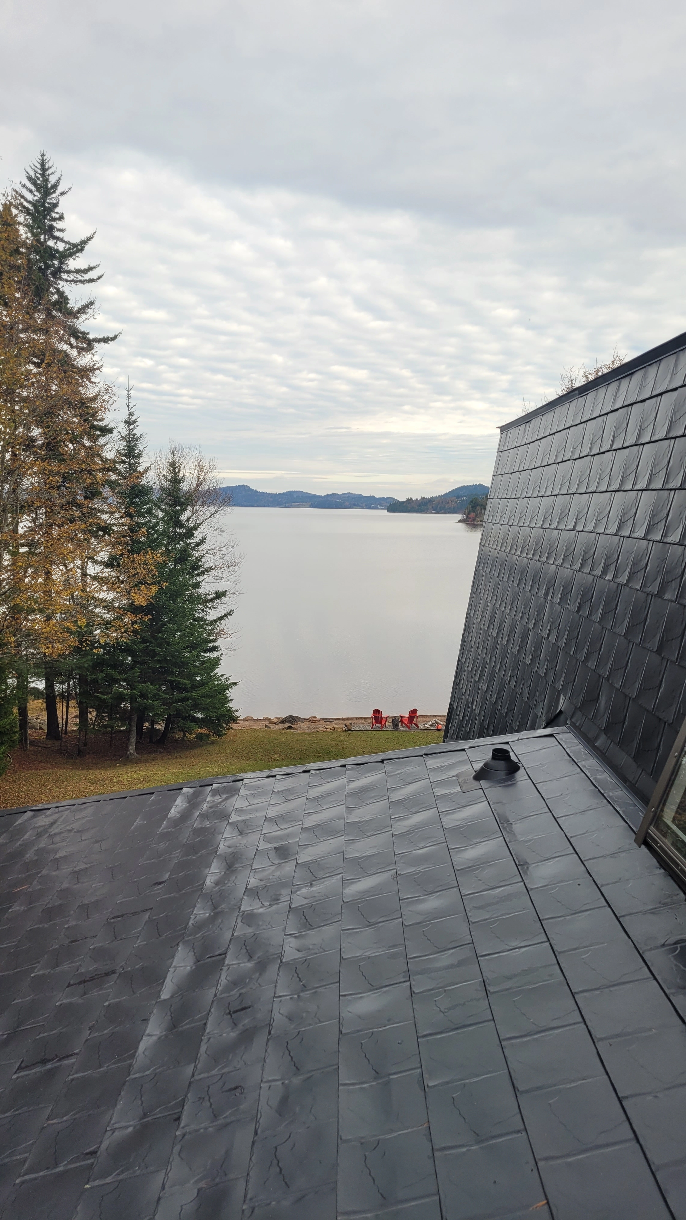 Black Interlock Slate aluminum roof on a waterfront home with a modern roof in Utopia, New, Utopia, New Brunswick
