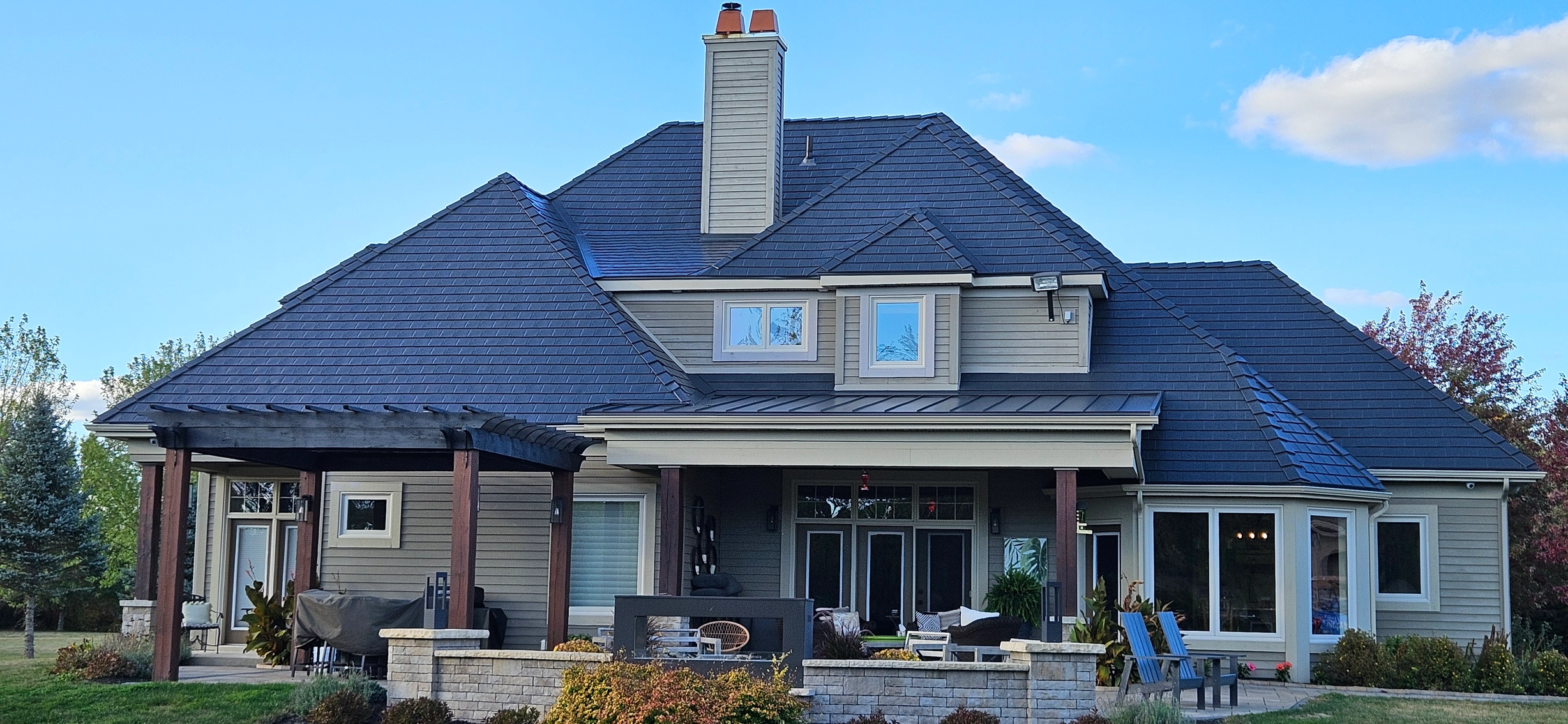 Deep Charcoal Interlock Slate aluminum roof on a Deep Charcoal Interlock Slate metal roof on a rural, Sussex, New Brunswick