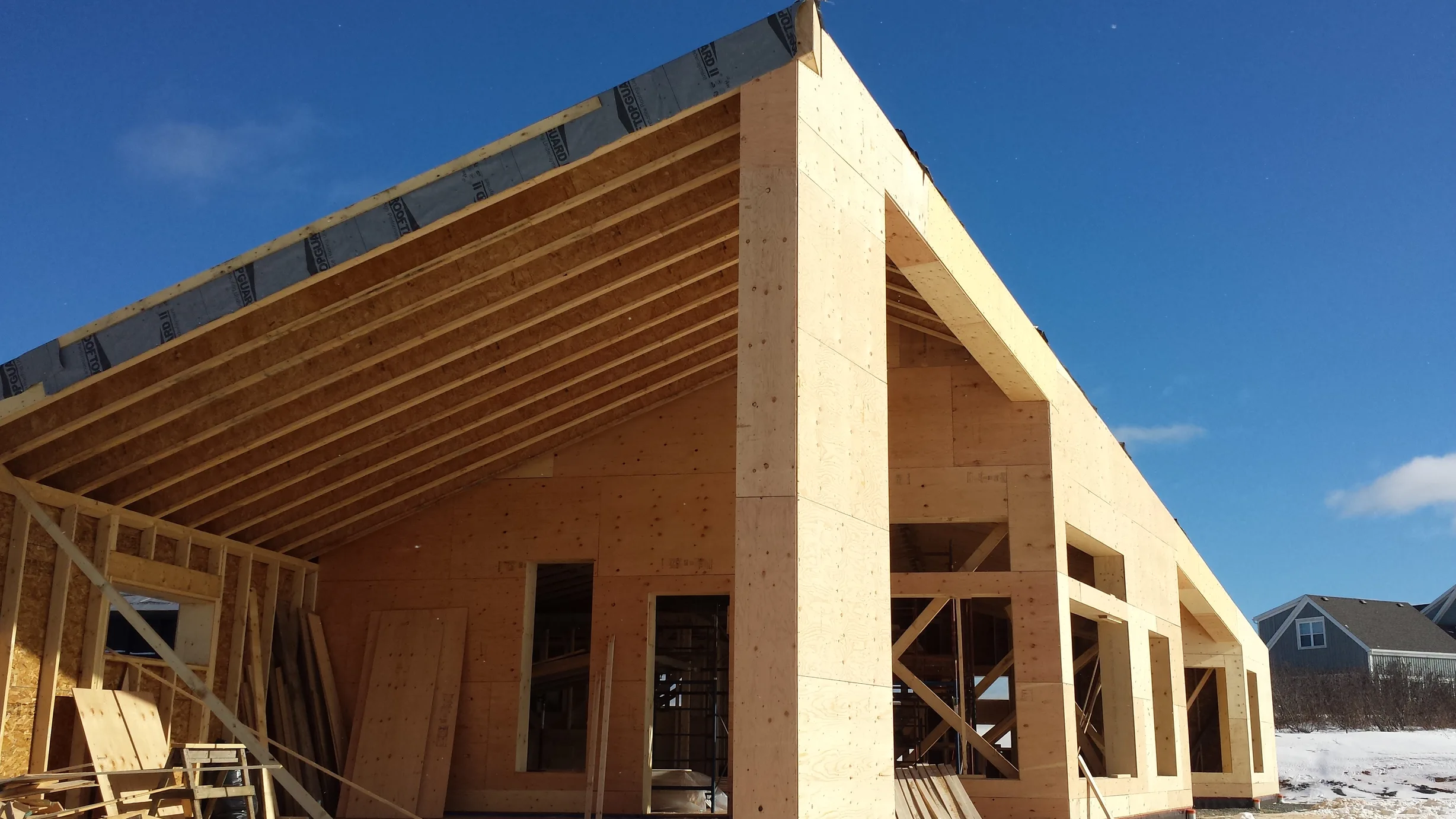Deep Charcoal Interlock Standing Seam aluminum roof on the home, Cow Bay, Nova Scotia