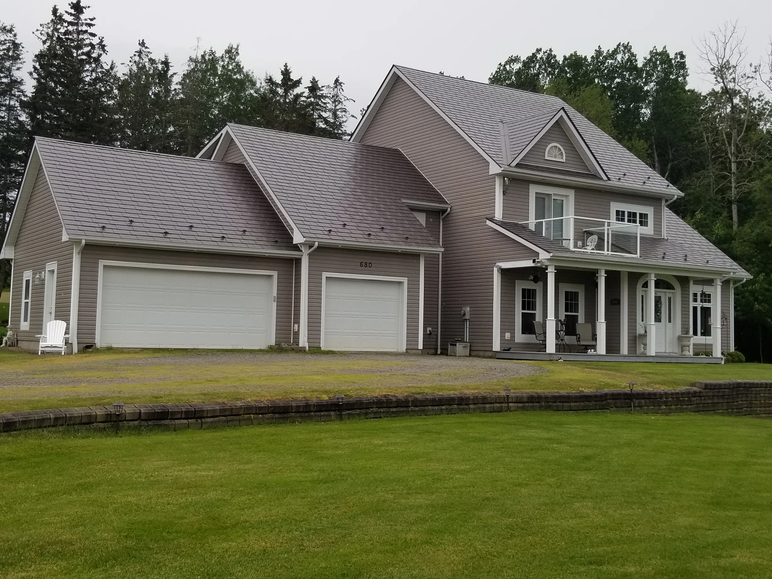 Tudor Brown Interlock Slate aluminum roof on the home, Canning, Nova Scotia