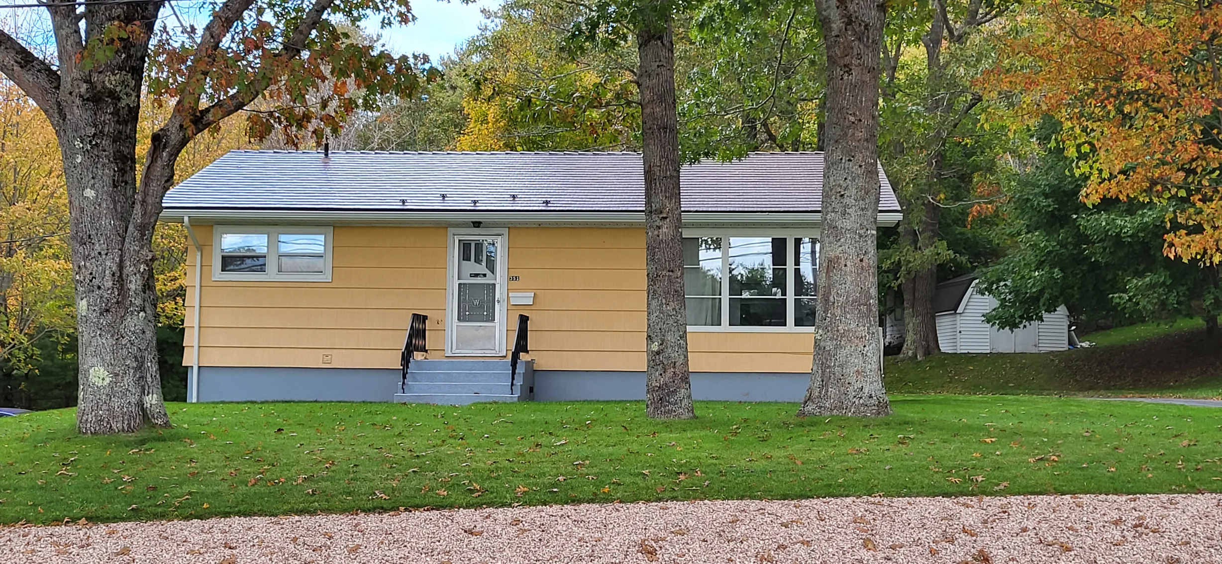 Colonial Brown Interlock Cedar Shingle aluminum roof on the home, Bridgewater, Nova Scotia