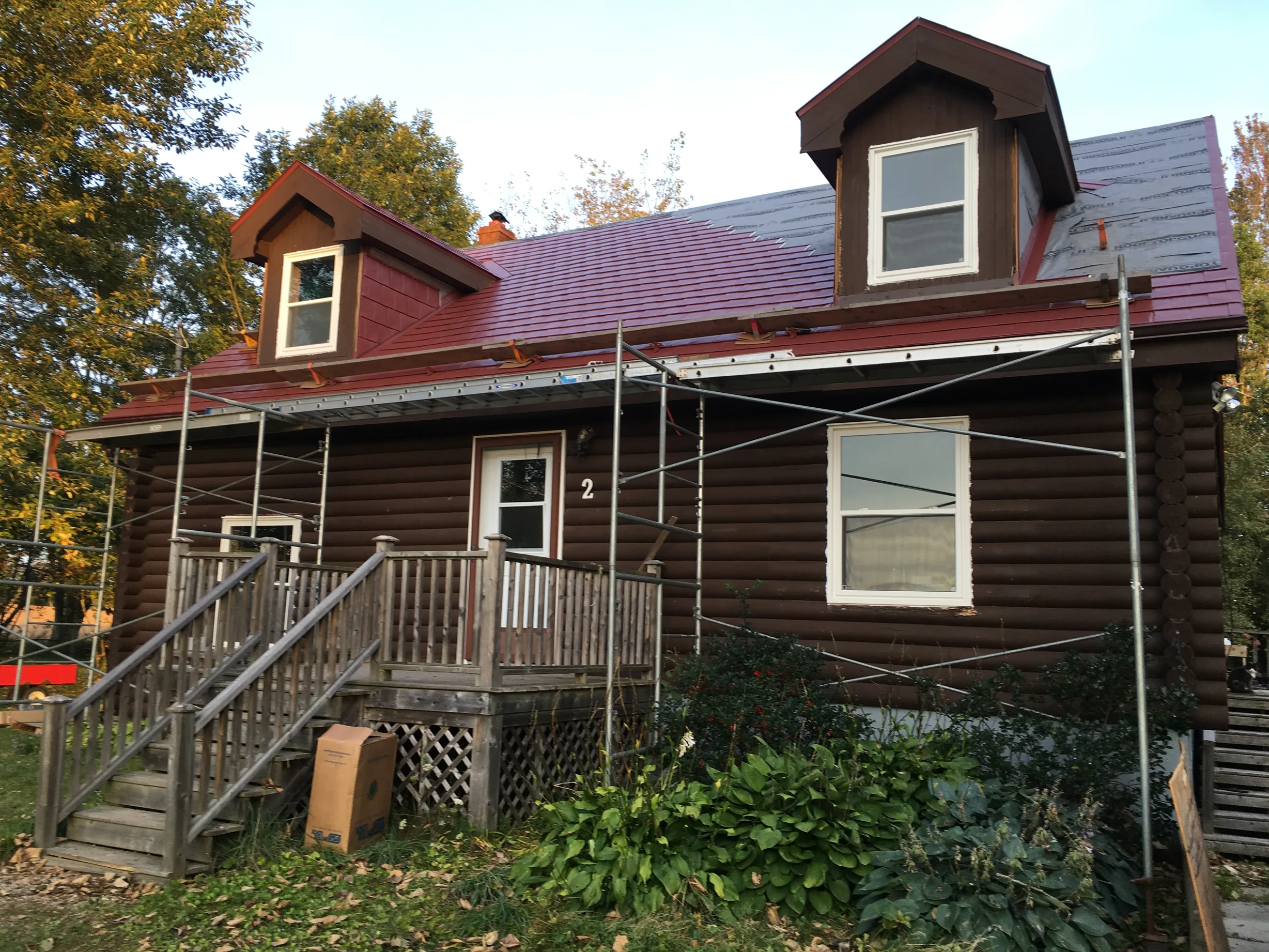 Tile Red Interlock Slate aluminum roof on the home, Woodville, Nova Scotia