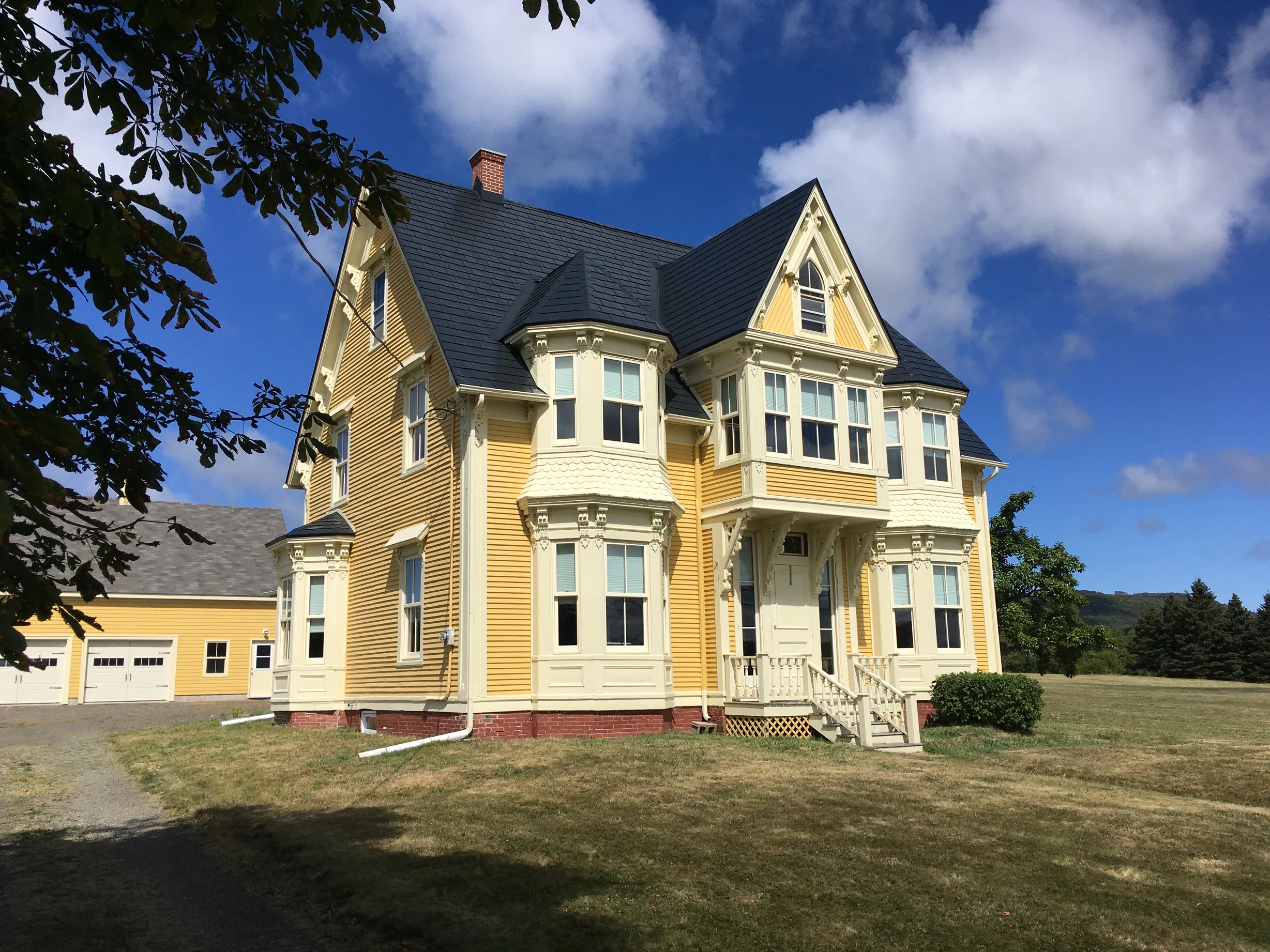 Black Interlock Slate aluminum roof on the home with ridge cap and ridge vent, Granville Ferry, Nova Scotia