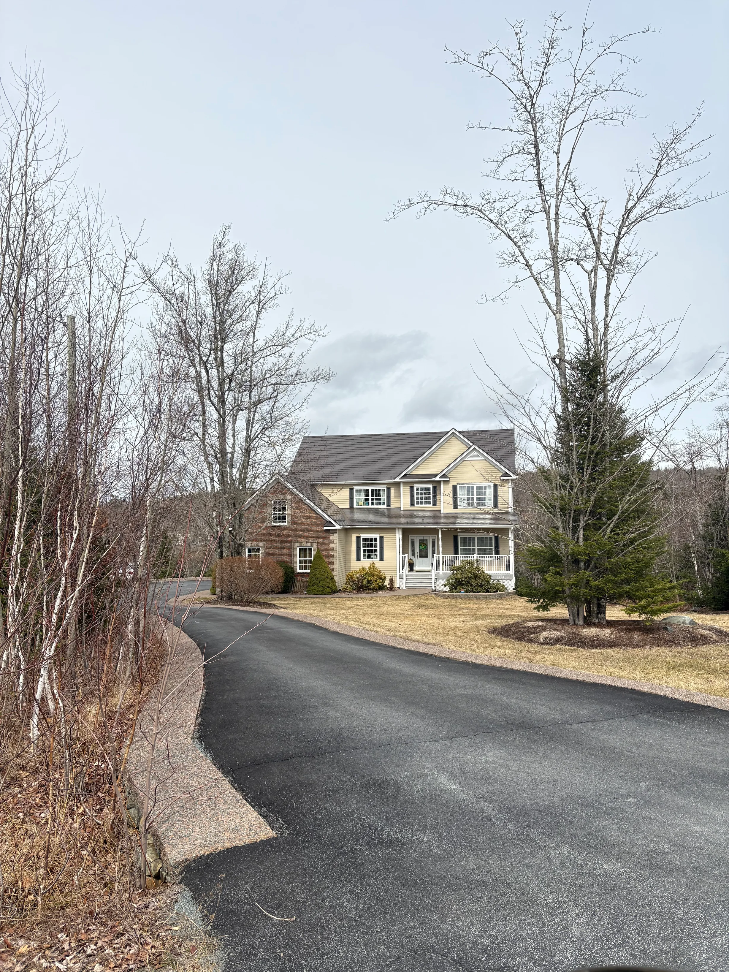 Tudor Brown Interlock Slate aluminum roof on the home, Fall River, Nova Scotia