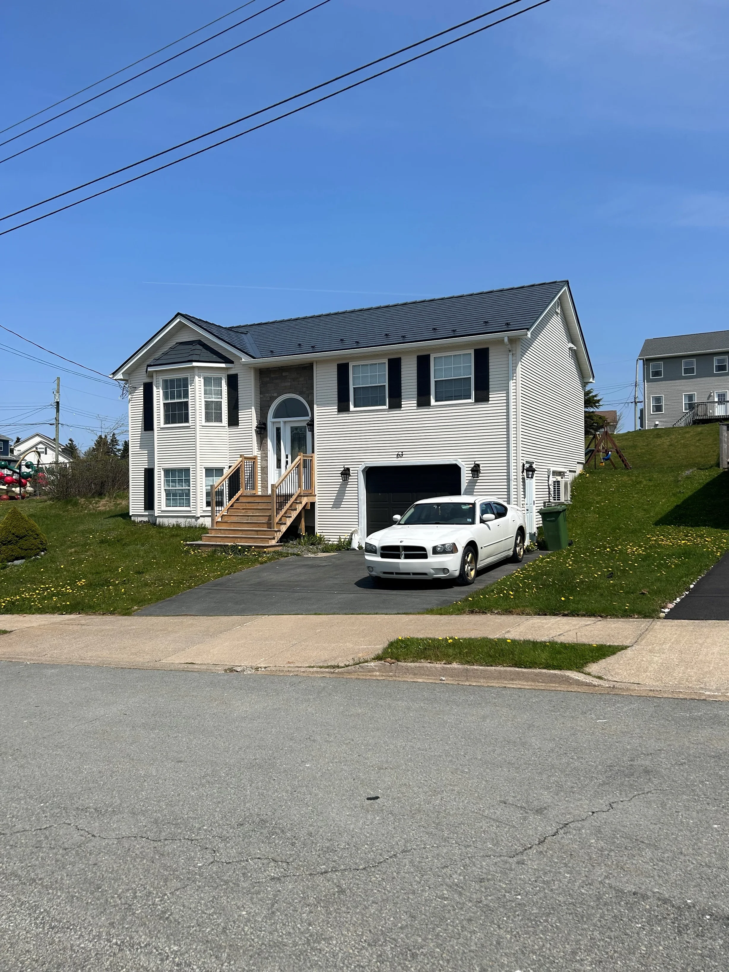 Deep Charcoal Interlock Slate aluminum roof on the home, Eastern Passage, Nova Scotia