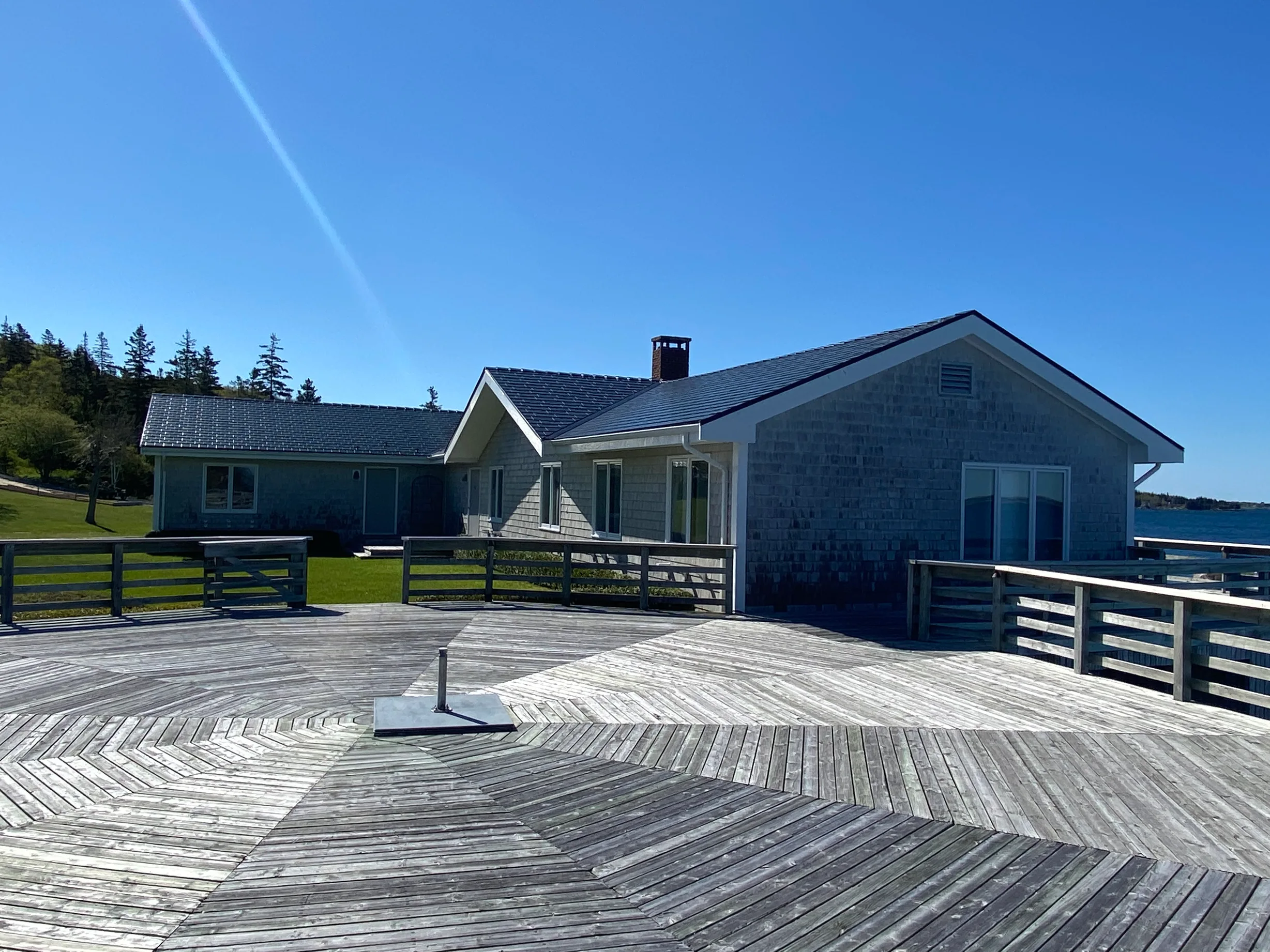 Black Interlock Slate aluminum roof on the home, East River, Nova Scotia