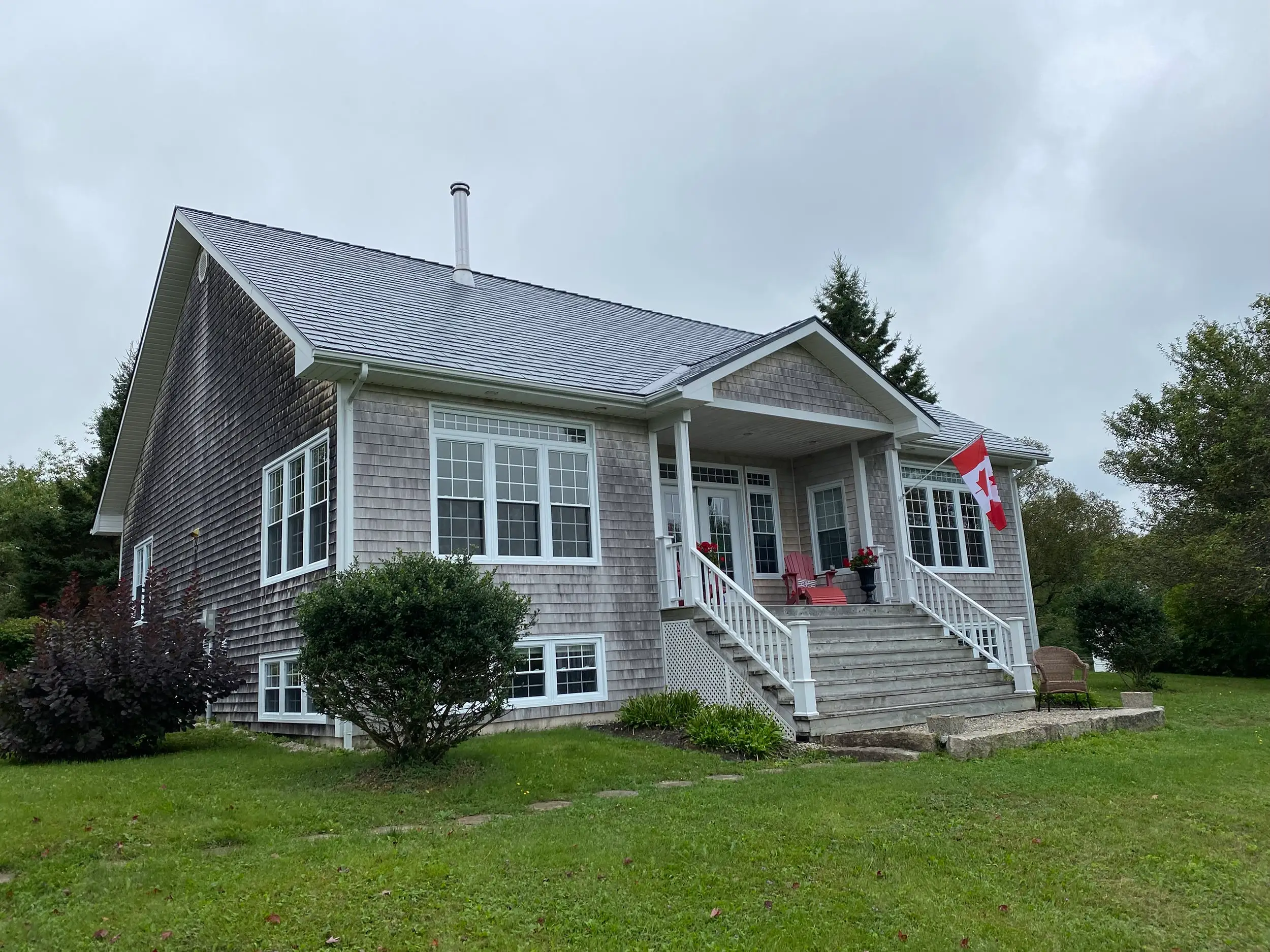 Interlock Aluminum Cedar Shingle Metal Roofing – Deep Charcoal | Chester Basin, NS (Rear elevation)