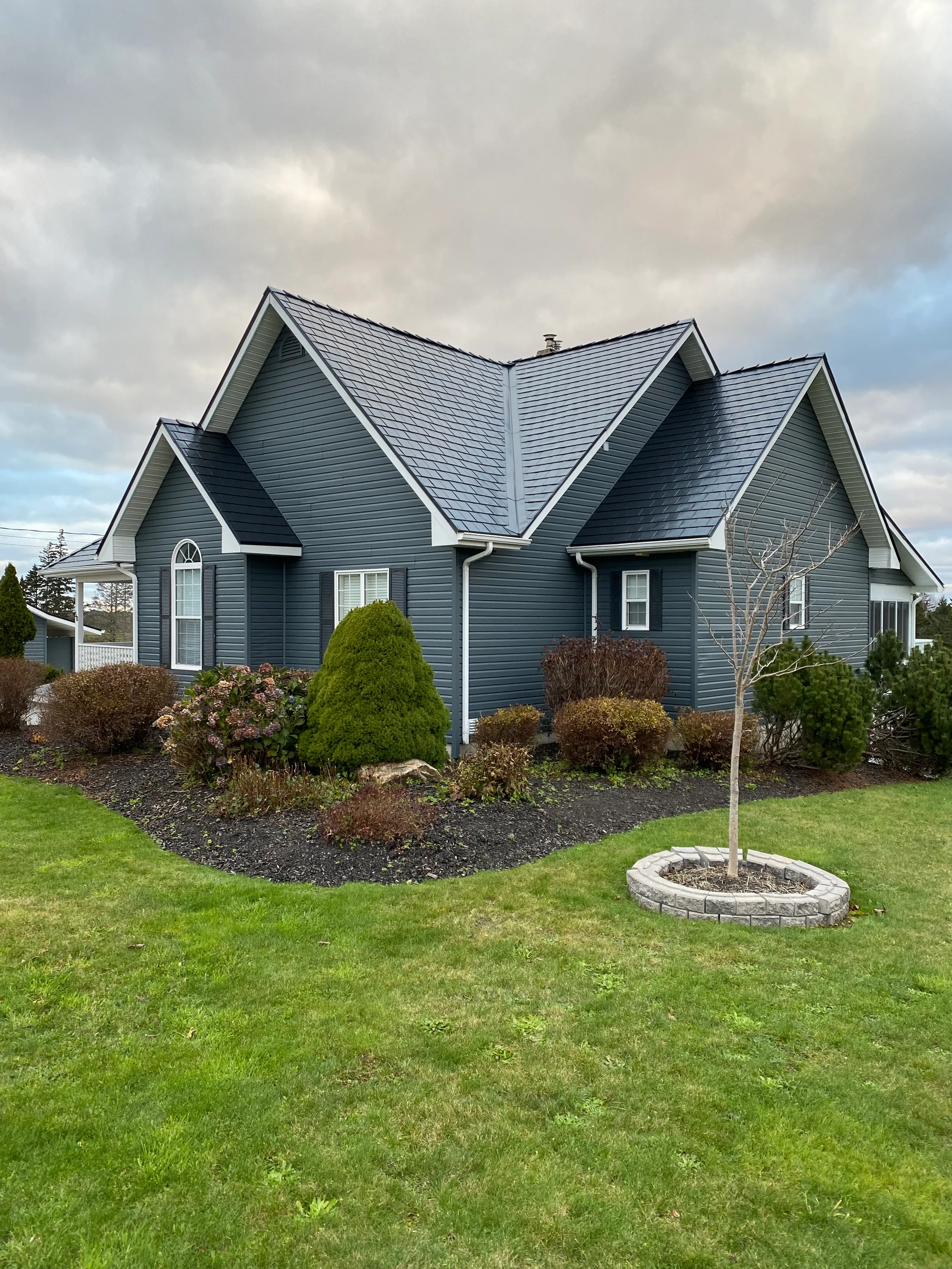 Black Interlock Slate aluminum roof on the home, Cheggogin, Nova Scotia