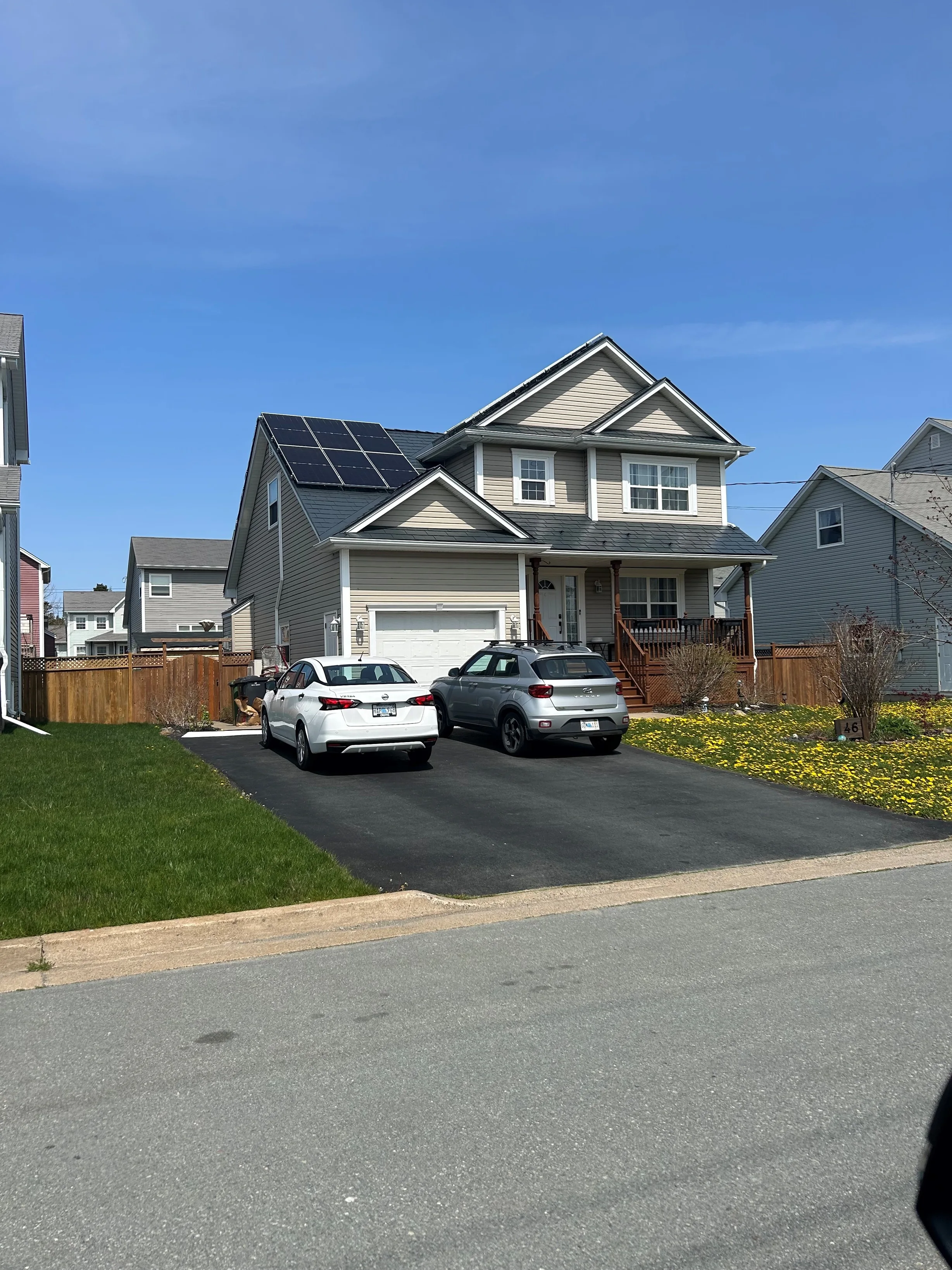 Deep Charcoal Interlock Slate aluminum roof on the home, Eastern Passage, Nova Scotia
