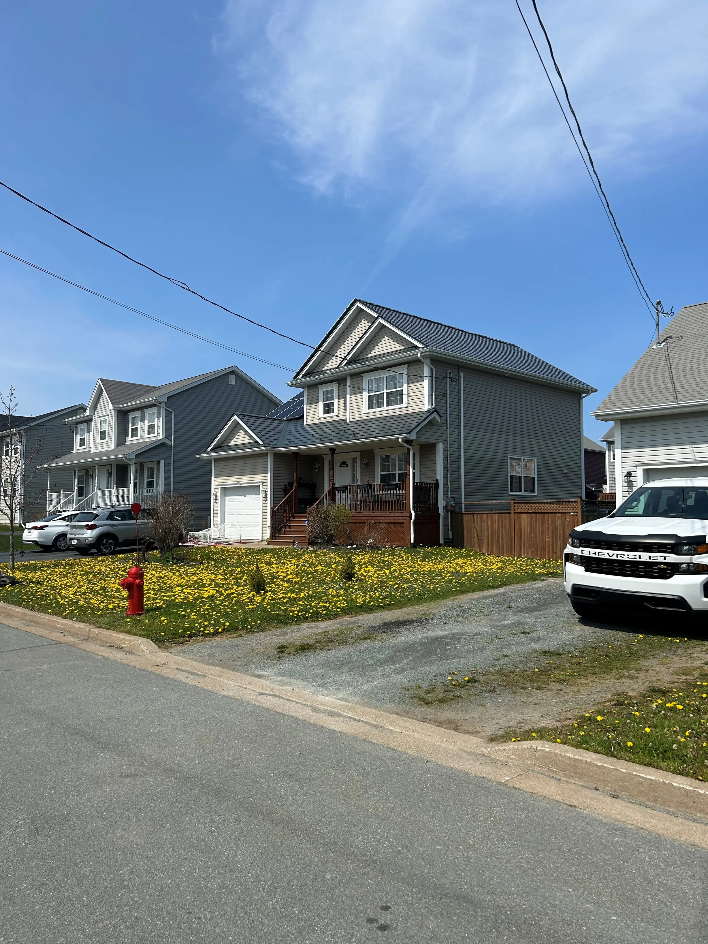 Deep Charcoal Interlock Slate aluminum roof on the home, Eastern Passage, Nova Scotia
