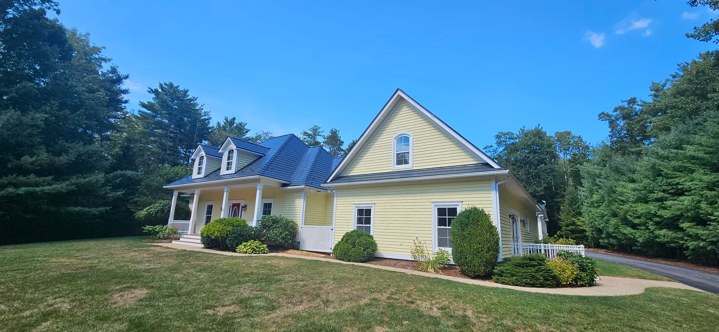 Deep Charcoal Interlock Slate aluminum roof on the home, Upper LaHave, Nova Scotia