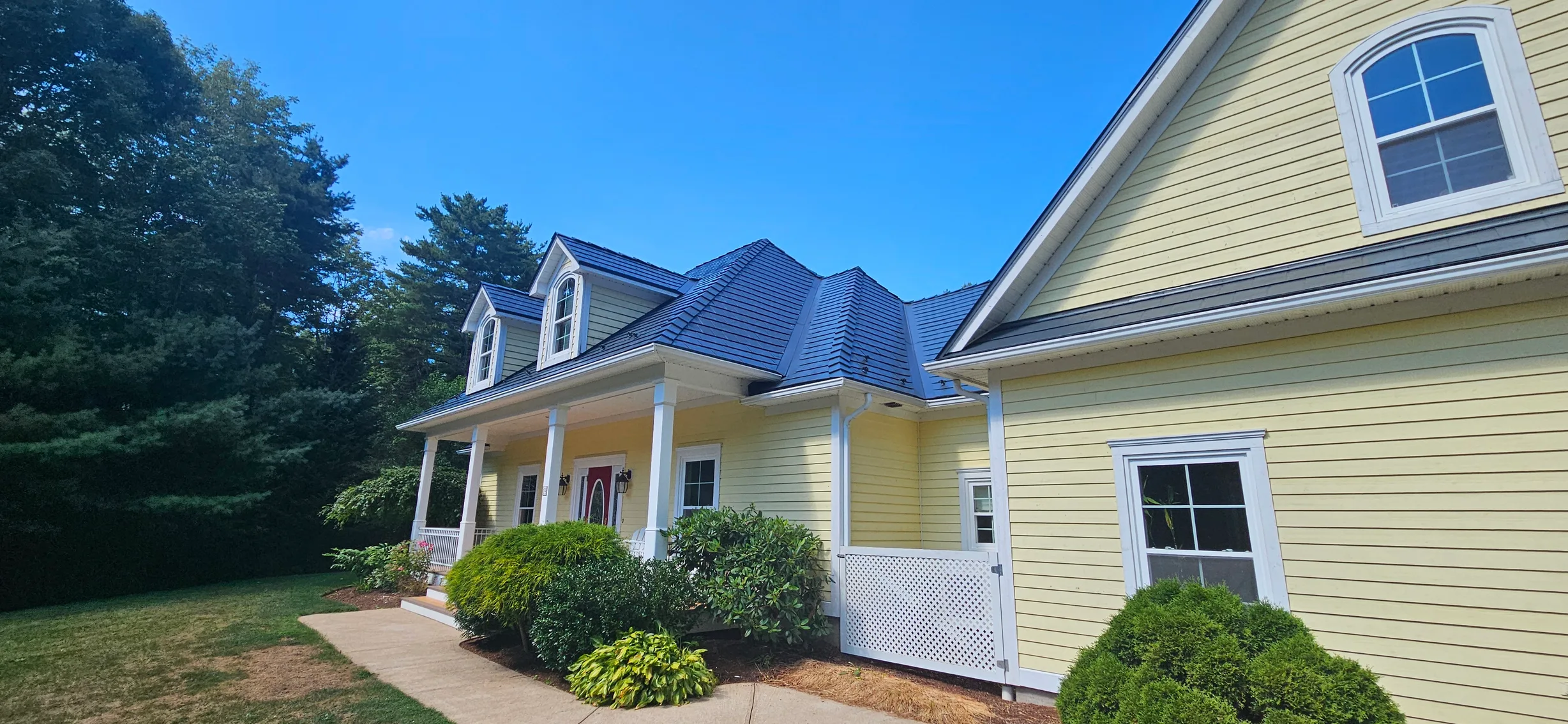 Deep Charcoal Interlock Slate aluminum roof on the home, Upper LaHave, Nova Scotia