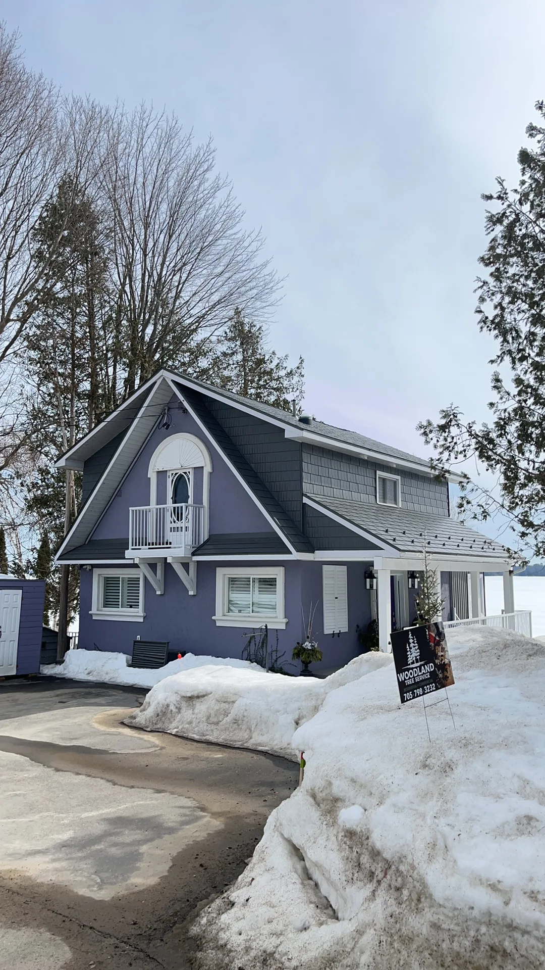 Musket Grey Interlock Cedar Shingle aluminum roof on a grey two-storey chalet with a Musket Grey metal roof, Severn, Ontario