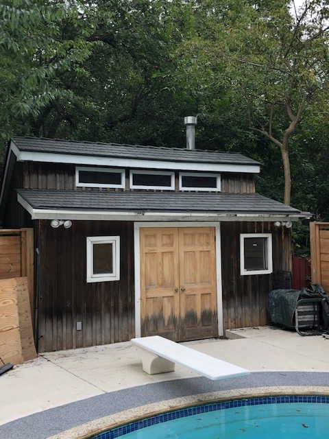 Musket Grey Interlock Cedar Shingle aluminum roof on a two-storey home with a metal roof in a suburban setting, Mississauga, Ontario