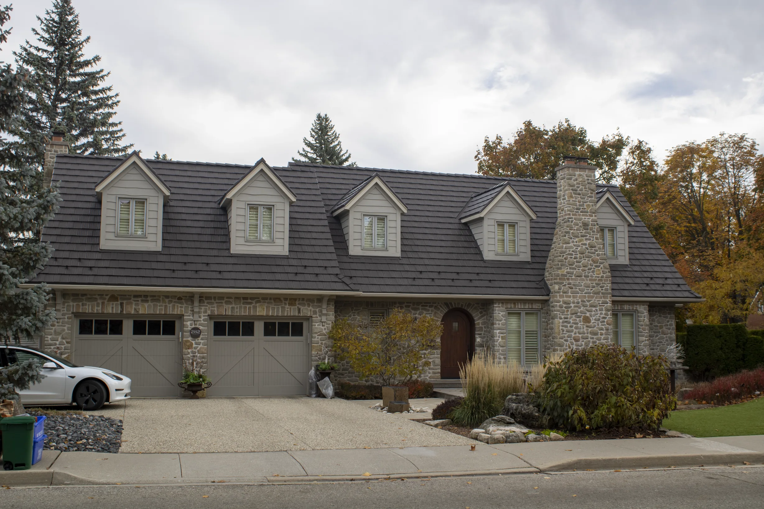 Tudor Brown Interlock Shake aluminum roof on a Tudor brown Interlock Shake metal roof on a house in, Waterloo, Ontario