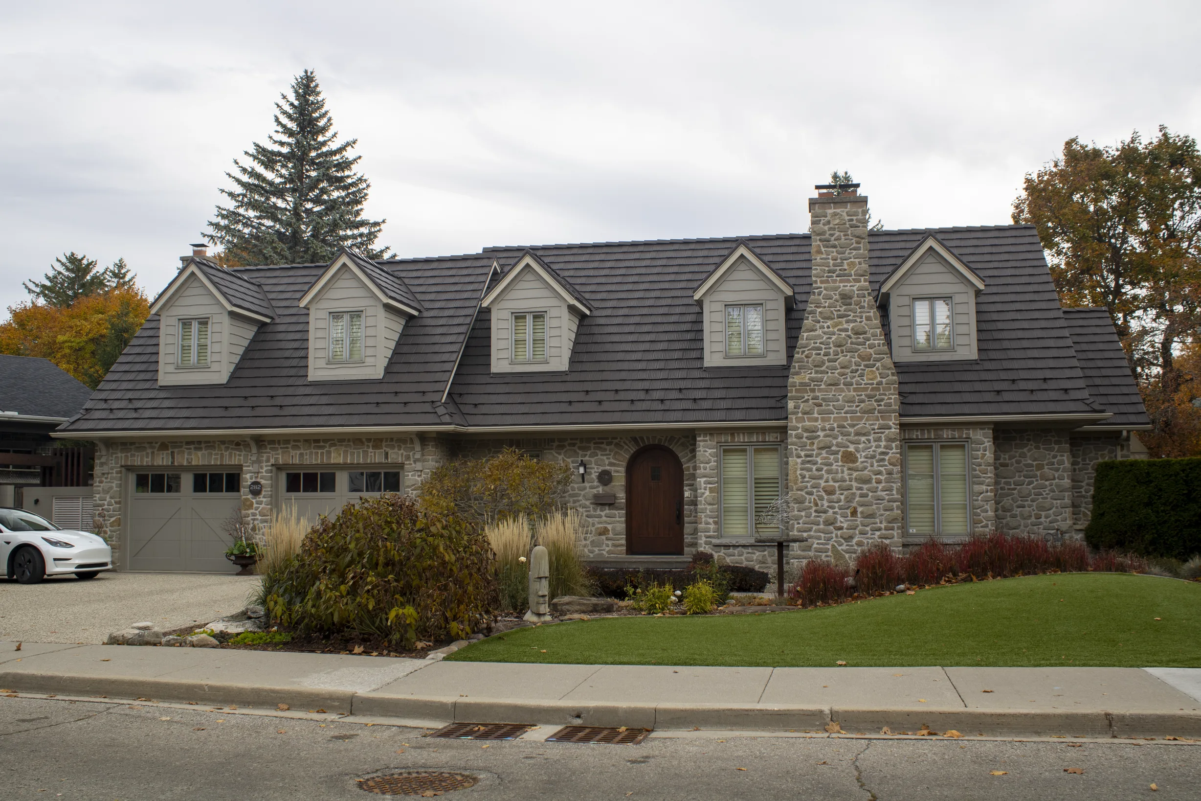 Tudor Brown Interlock Shake aluminum roof on a Tudor home with brown Interlock Shake metal roof in, Waterloo, Ontario