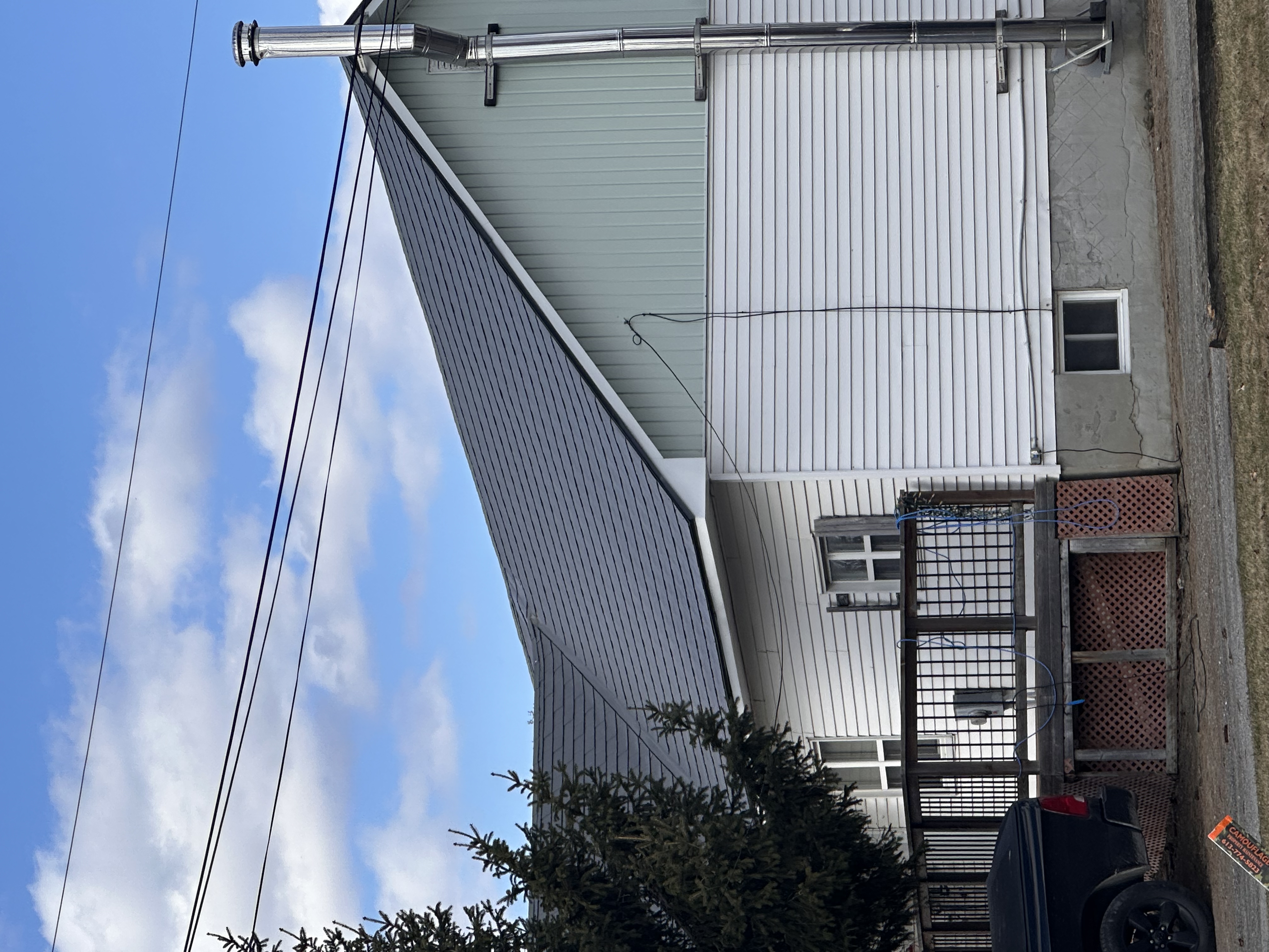 Interlock Aluminum Shingle Metal Roofing – Charcoal Grey | Chesterville, ON (Front-left elevation)